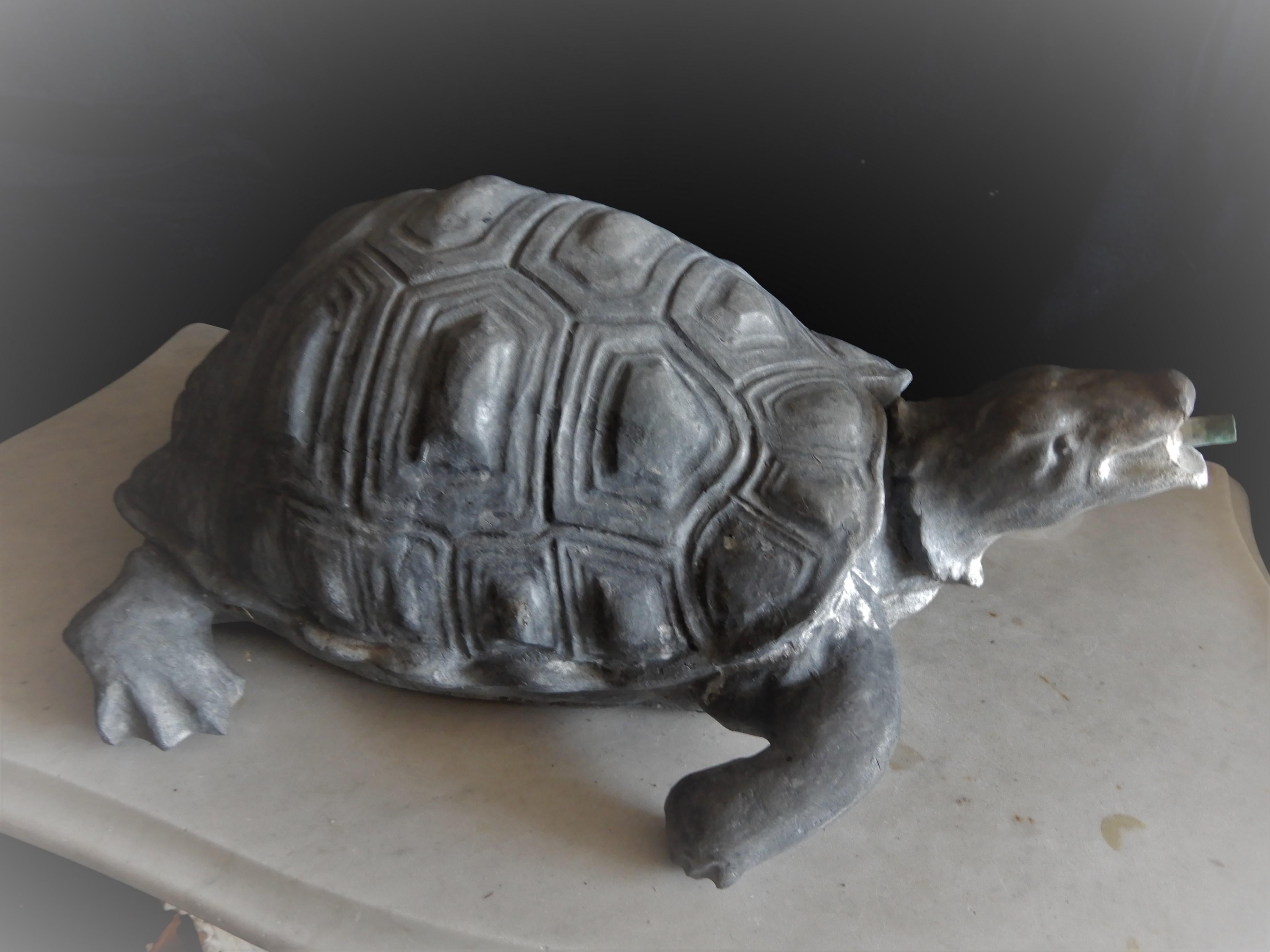 A lead fountain of a turtle by Florentine Craftsman. I have photos from the catalog showing the turtle but they were too small to post to this website. The turtle was purchased from a landscaper/collector who went to Florentine Craftsman in NYC to