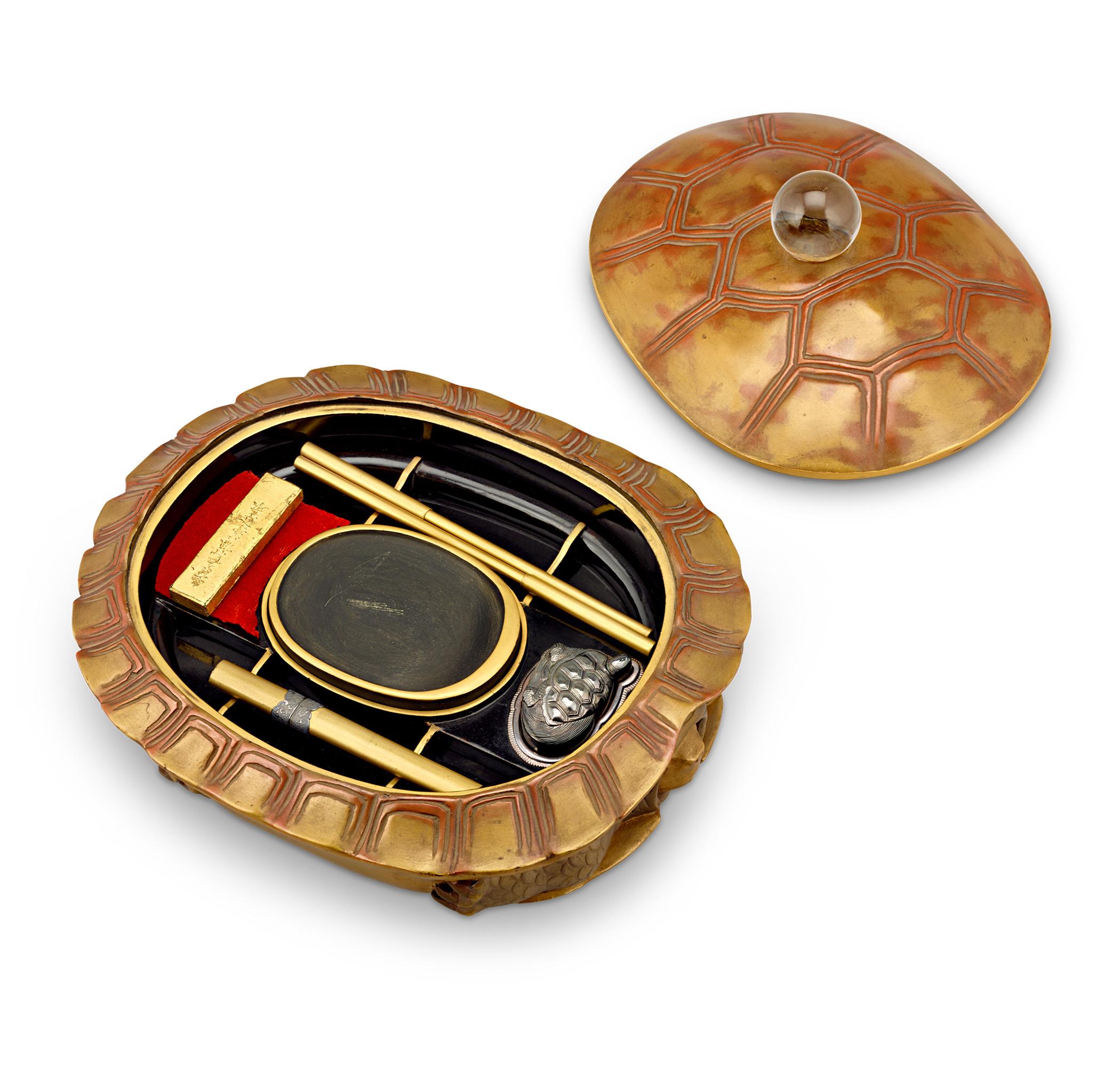 Turtle Lacquerware Writing Box
19th-century

This rare 19th-century turtle-shaped suzuribako (writing box) is made with exquisite Japanese lacquer artistry and imaginative design. Every element reflects the exceptional craftsmanship of the late Edo