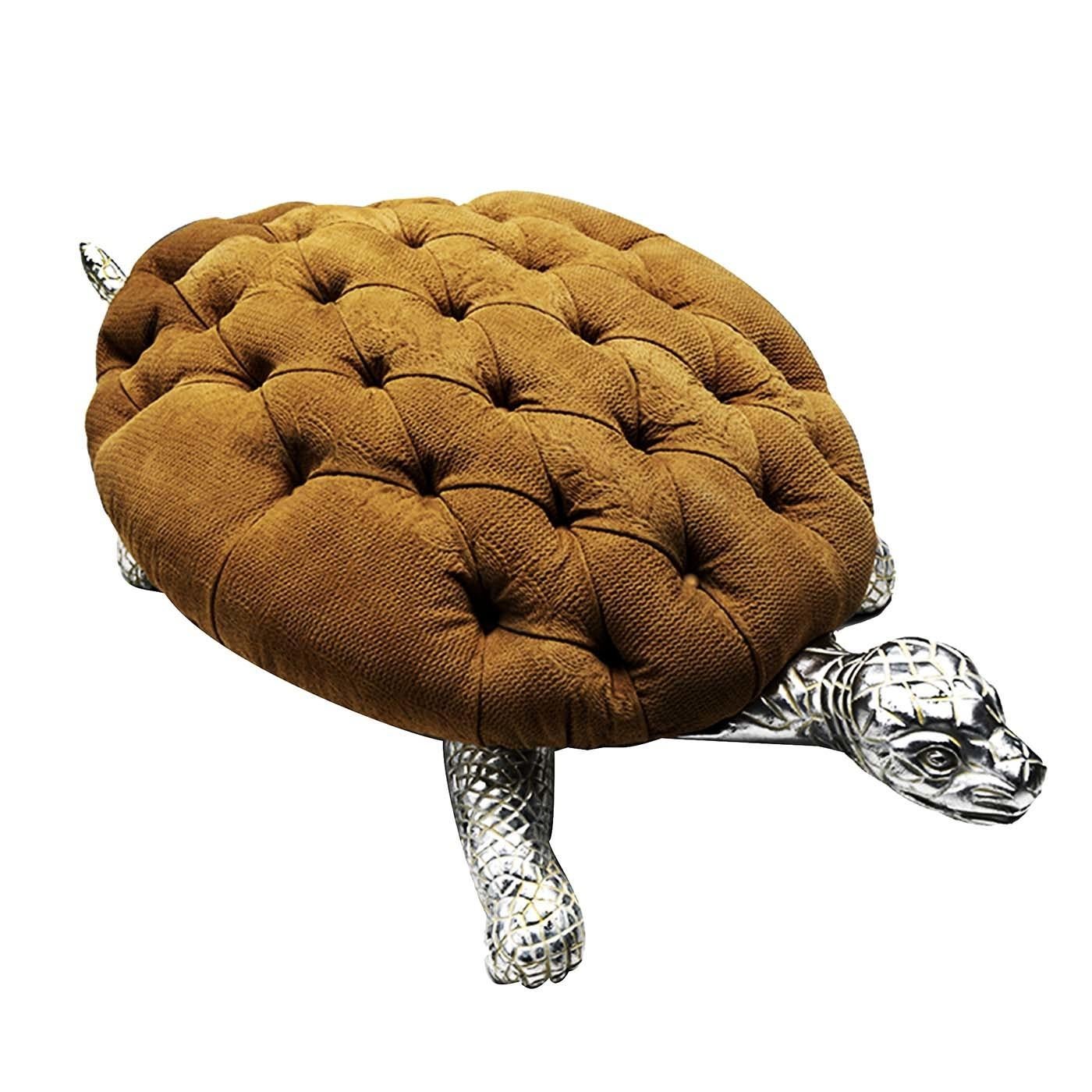 This superb pouf strikes a perfect balance between playfulness and elegance, with a designed borrowed from nature and fashioned to match a sophisticated interior. The frame of this eclectic object of functional decor is in carved wood covered with a