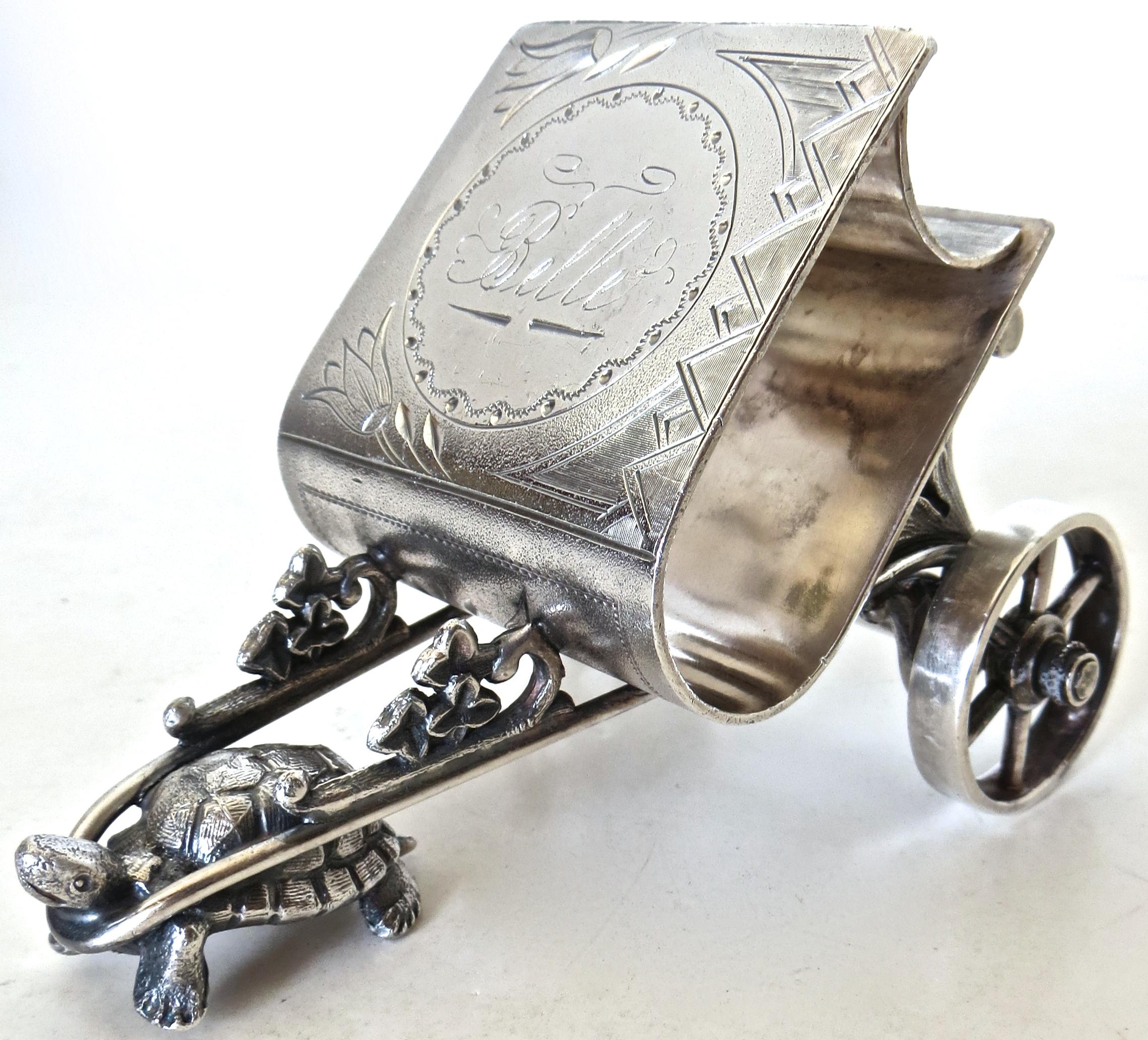 This is a very rare American silver plated Victorian figural napkin ring; attaining the status of A+ (rarest; only a few examples known) in Sandra Whitson's study, 