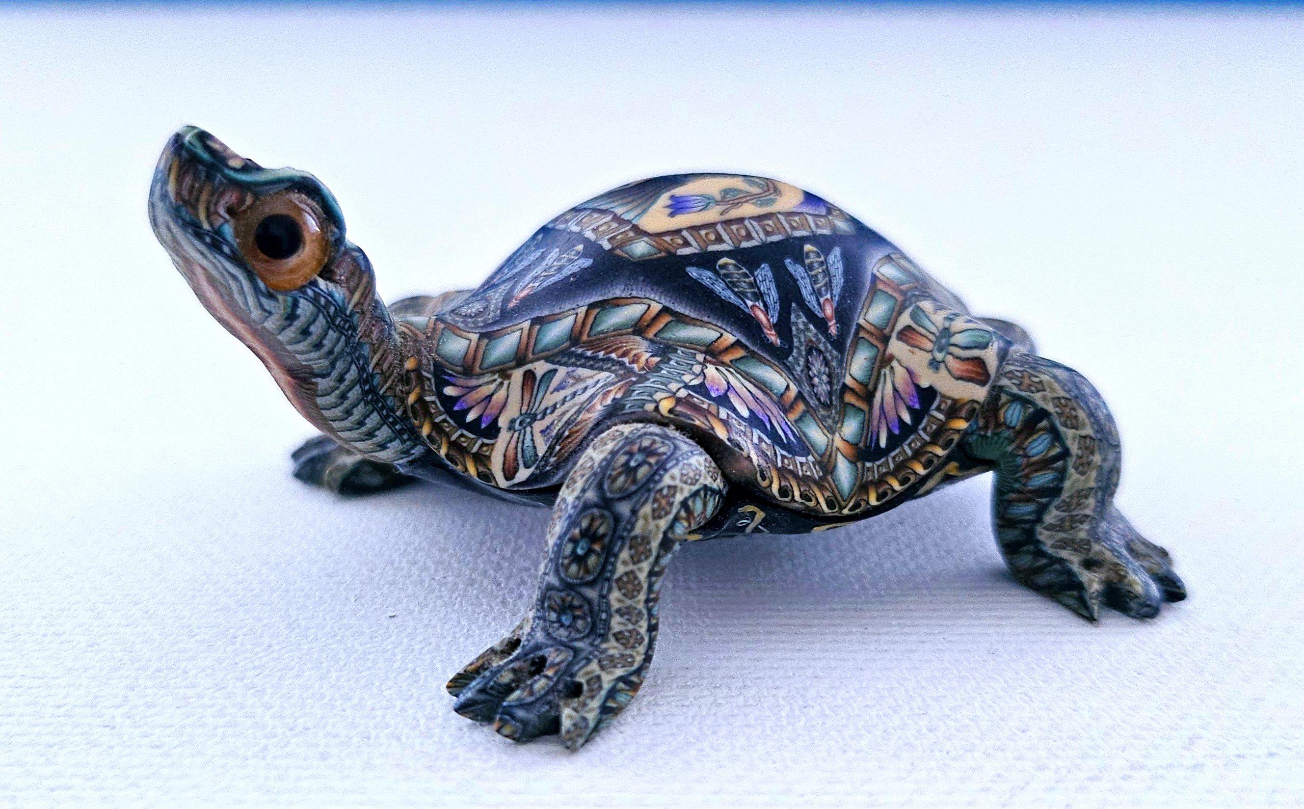 Turtle Sculpture by Jon Stuart Anderson, signed and dated.
This handsome miniature sculpture is by the renowned fimo sculptor Jon Stuart Anderson. It was owned by one person who had kept it stored since purchase in 2003 so it is in very nice vintage
