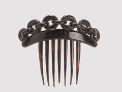 Turtleshell hair comb-diadem with chain motif, France 1900.