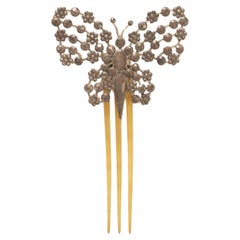 Antique Turtleshell hair comb with butterfly in cutnsteel, France 1900. 