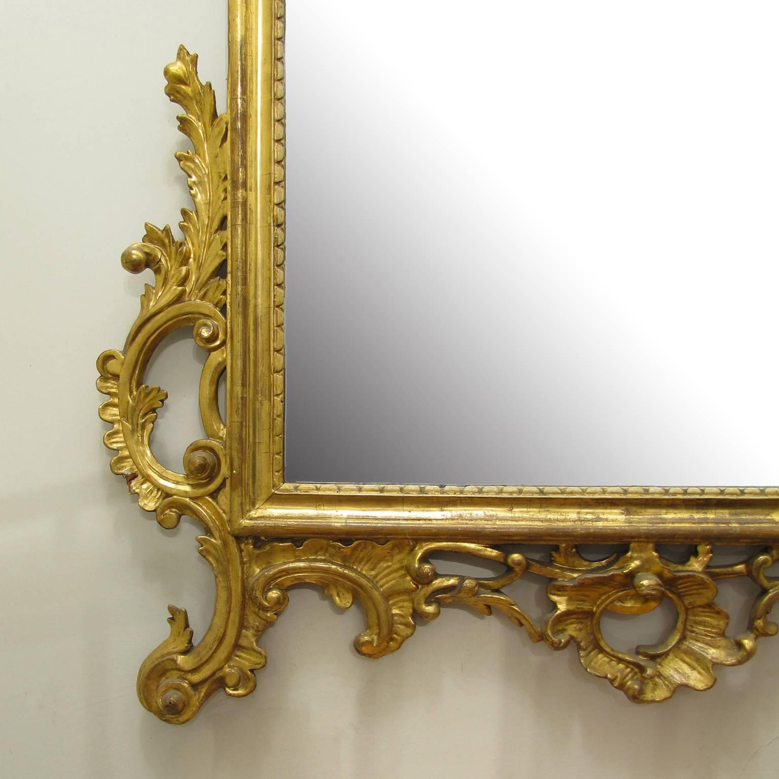Tuscan Late 19th Century Louis XVI Mirror with a Carved and Gilt Wooden Frame In Good Condition For Sale In Firenze, IT
