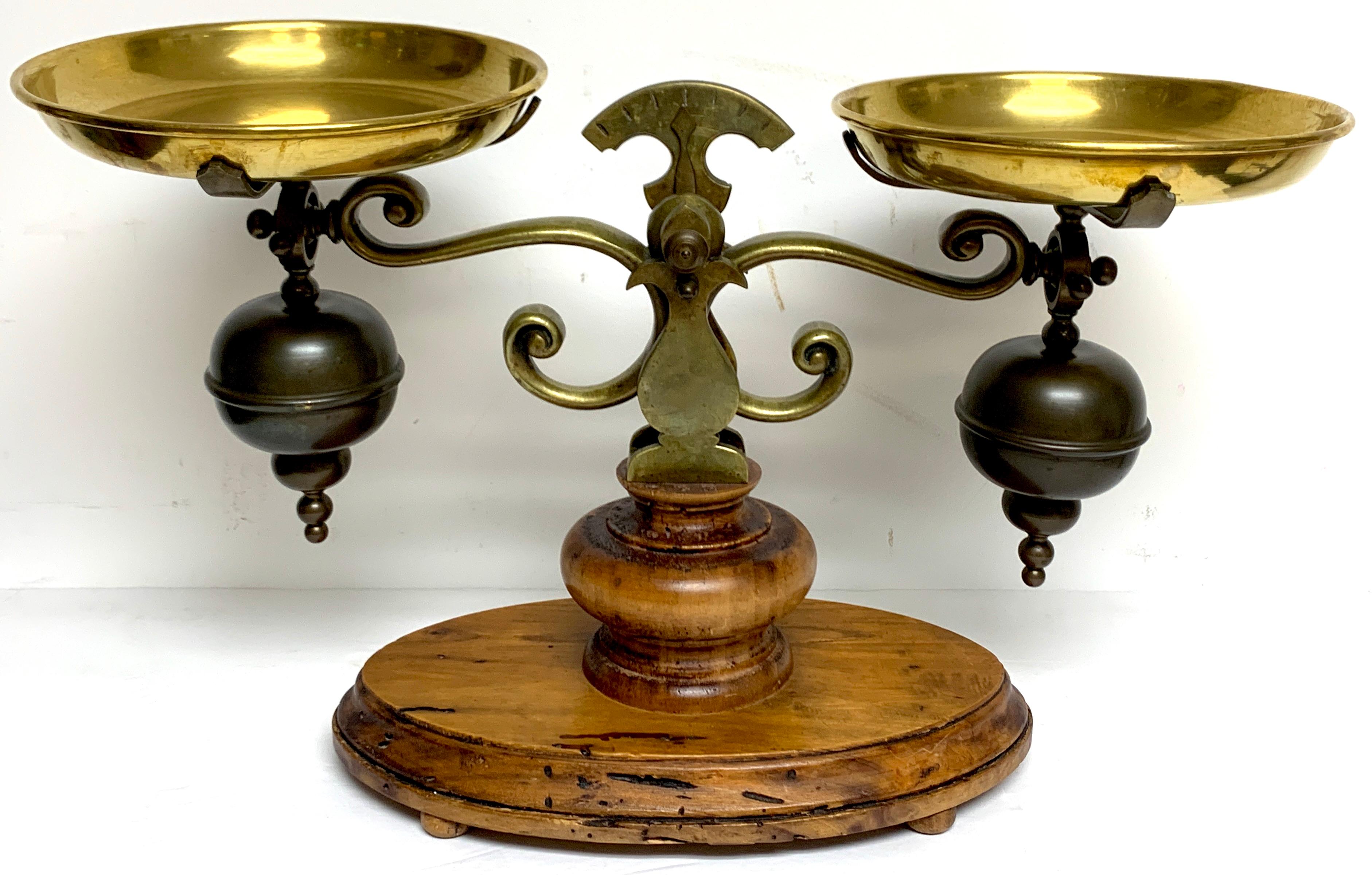 Tuscan olive wood & brass balance scale, Finley cast with two 7.5 inch diameter removable brass pans, raised on a 12