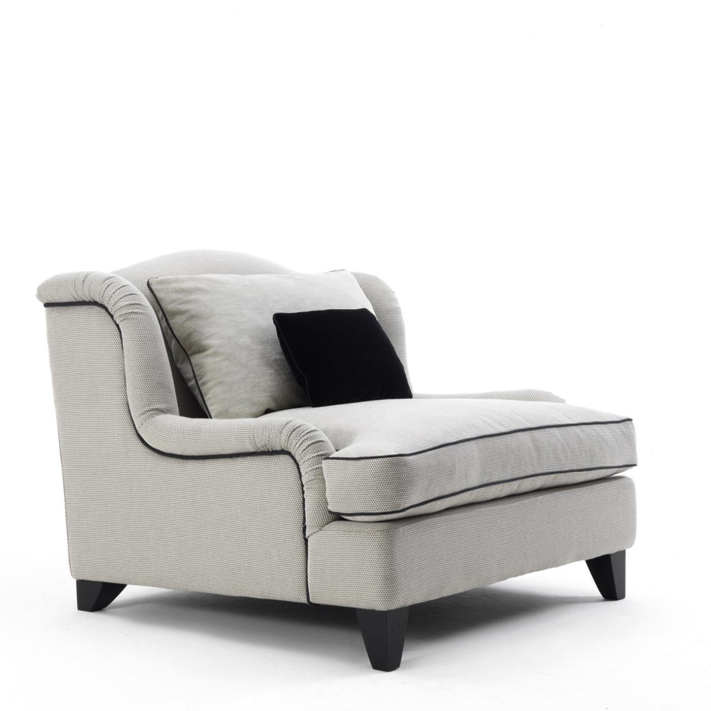 Old-fashioned glamour and exquisite craftsmanship create the ultimate lounging chair, an ideal addition to a classic living room, modern study or bedroom. The solid wood structure comprises feet in beechwood and is accented with the gentle curves of
