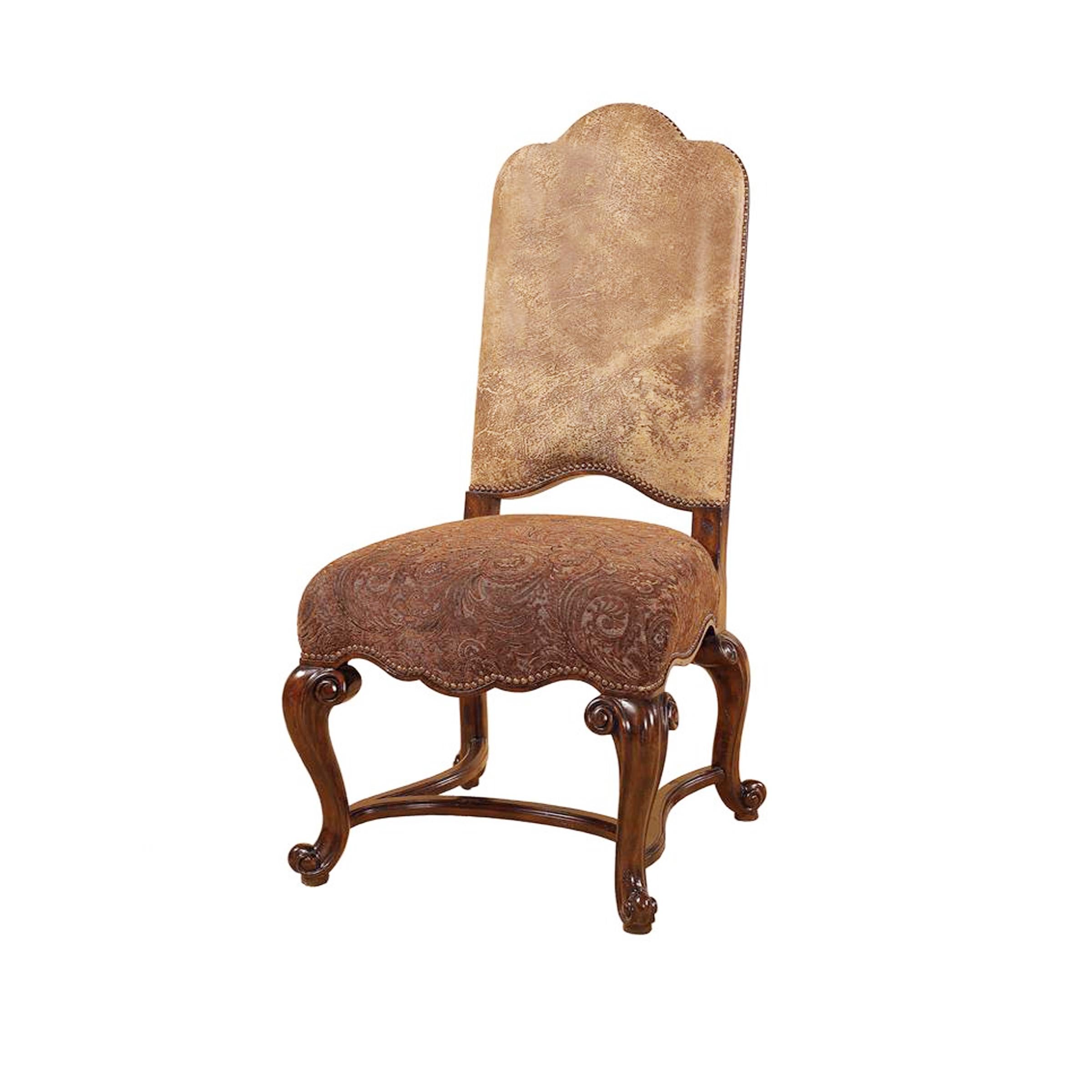 Set of 6 Renaissance Revival Style dining chairs

Suede leather backs with jewel-tone paisley print on the seats. High-end designer grade leather. Brass nail finished antique leather and dark lido finish. Camel back and cabriole legs with full