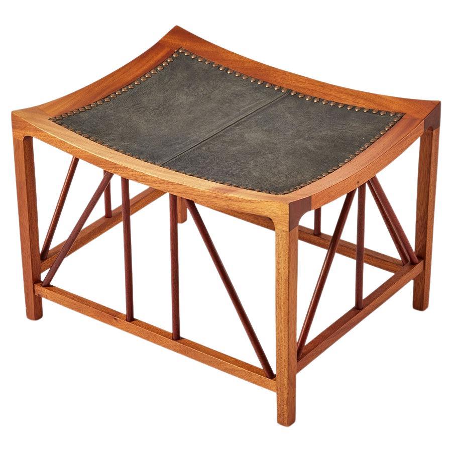 The Tutankhamun Mod 1063 Stool was created by Josef Frank for Svenskt Tenn in 1941 and was inspired by a stool found in Tutankhamun's tomb in November 1922. It is a magnificent object, very decorative, in its most beautiful mahogany version.
Josef