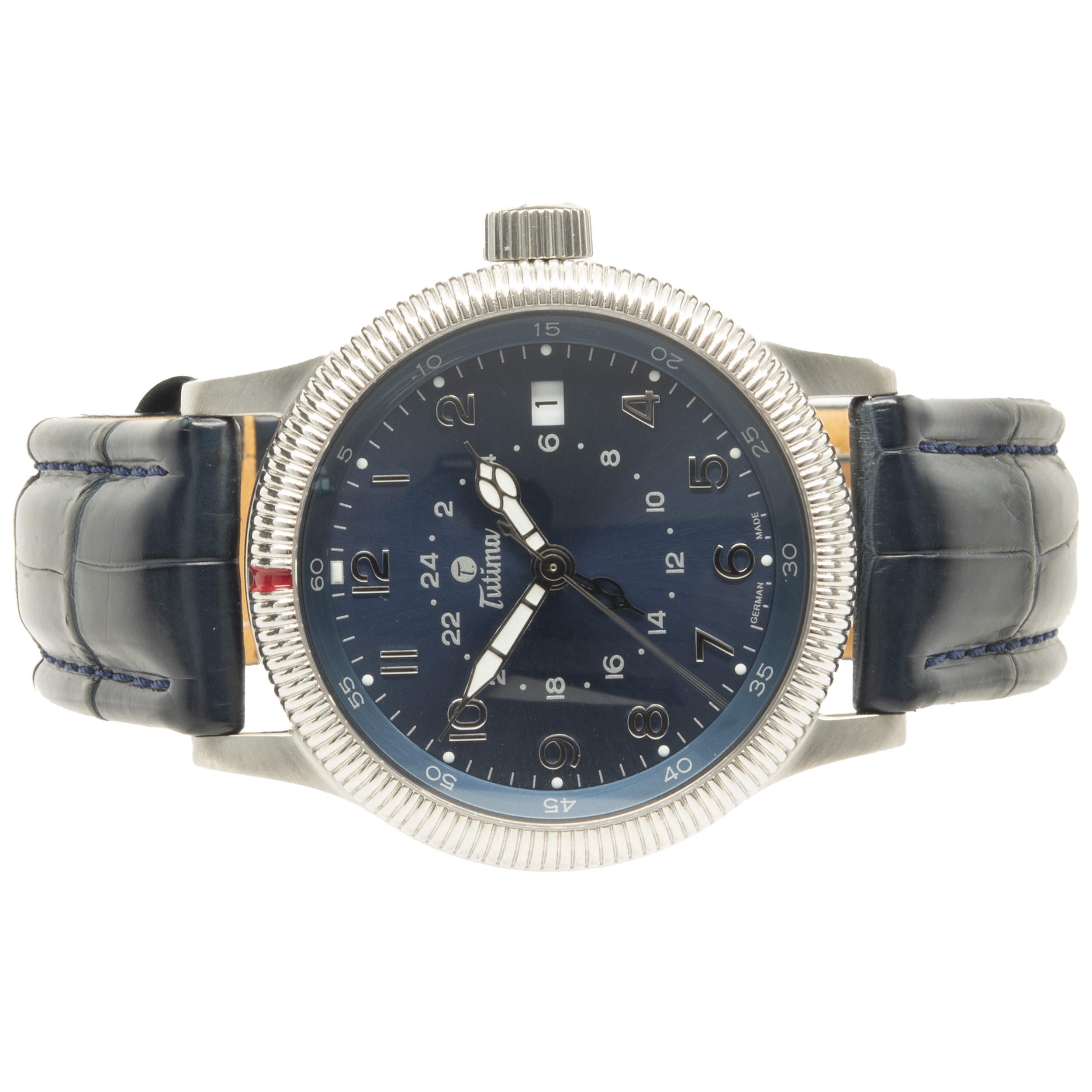 Movement: automatic
Function: hours, minutes, seconds, date, chronograph
Case: 36.5mm round steel case, sapphire crystal, push/pull crown
Bracelet: blue alligator leather, integrated clasp
Dial: blue arabic
Reference # Flieger GMT
Serial # 635
