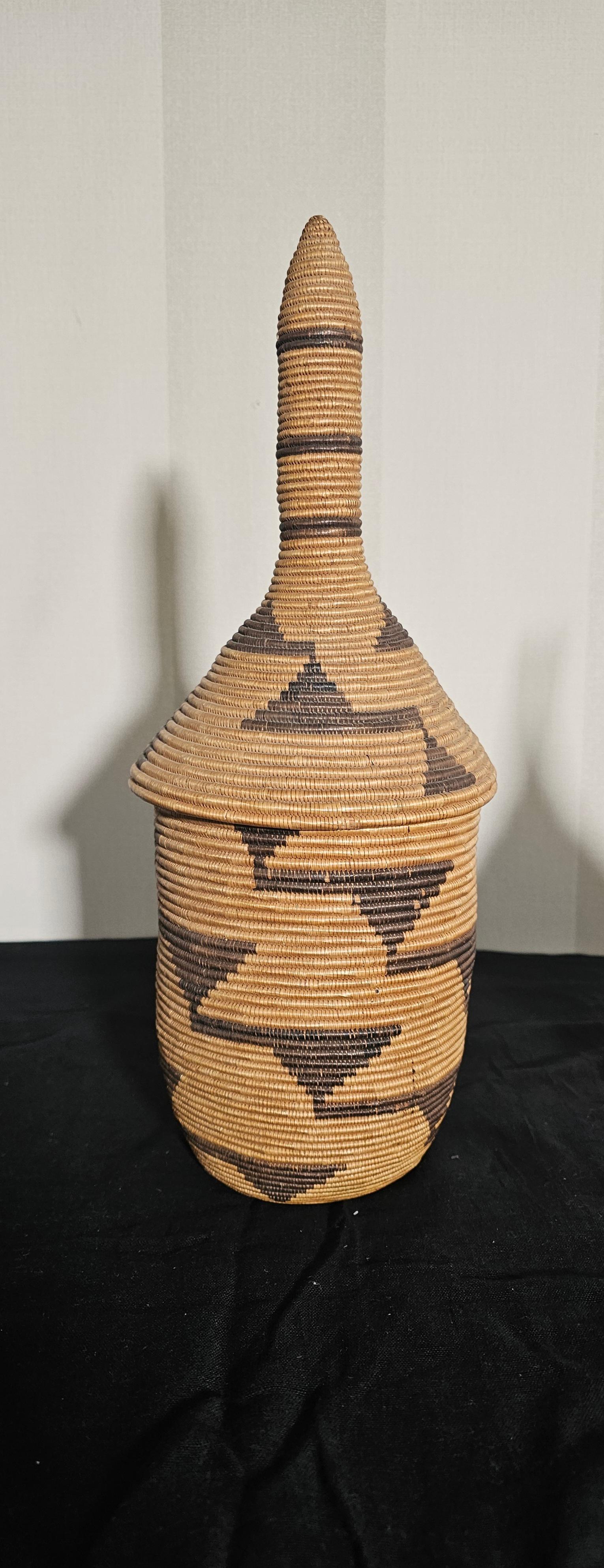 This is a beautiful pair of Ceremonial Baskets from the Tutsi people of Rwanda in East Africa. 
These baskets are handwoven and given as Wedding gifts with a trinket inside each basket . These are treasured family possessions and are handed down