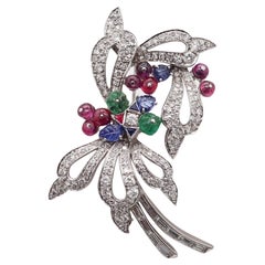 TUTTI FRUTTI 1950 Spilla con ciondolo Art-Deco in platino con diamanti e pietre preziose