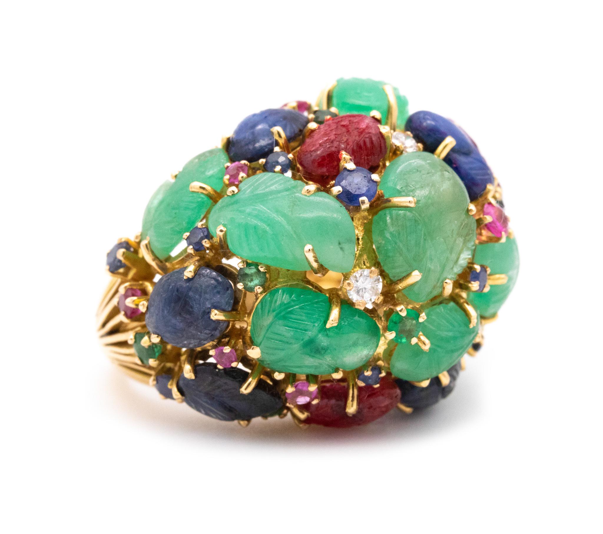 Colorful Tutti-Frutti jeweled domed cocktail ring.

Iconic colorful piece of jewelry from the late American art deco / mid century periods, circa 1950. The mounting elements was individually assembled and crafted in solid 18 karats of yellow