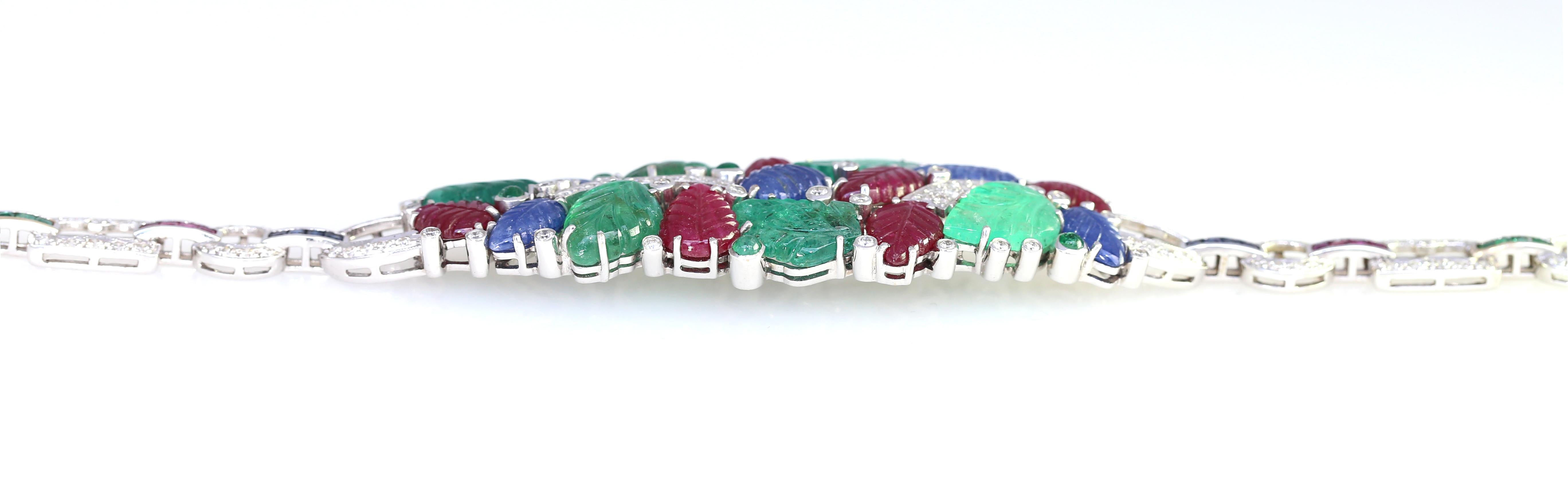 Taille cabochon Bracelet Tutti-Frutti certifié 18 carats, saphirs, émeraudes et diamants, 1996 en vente