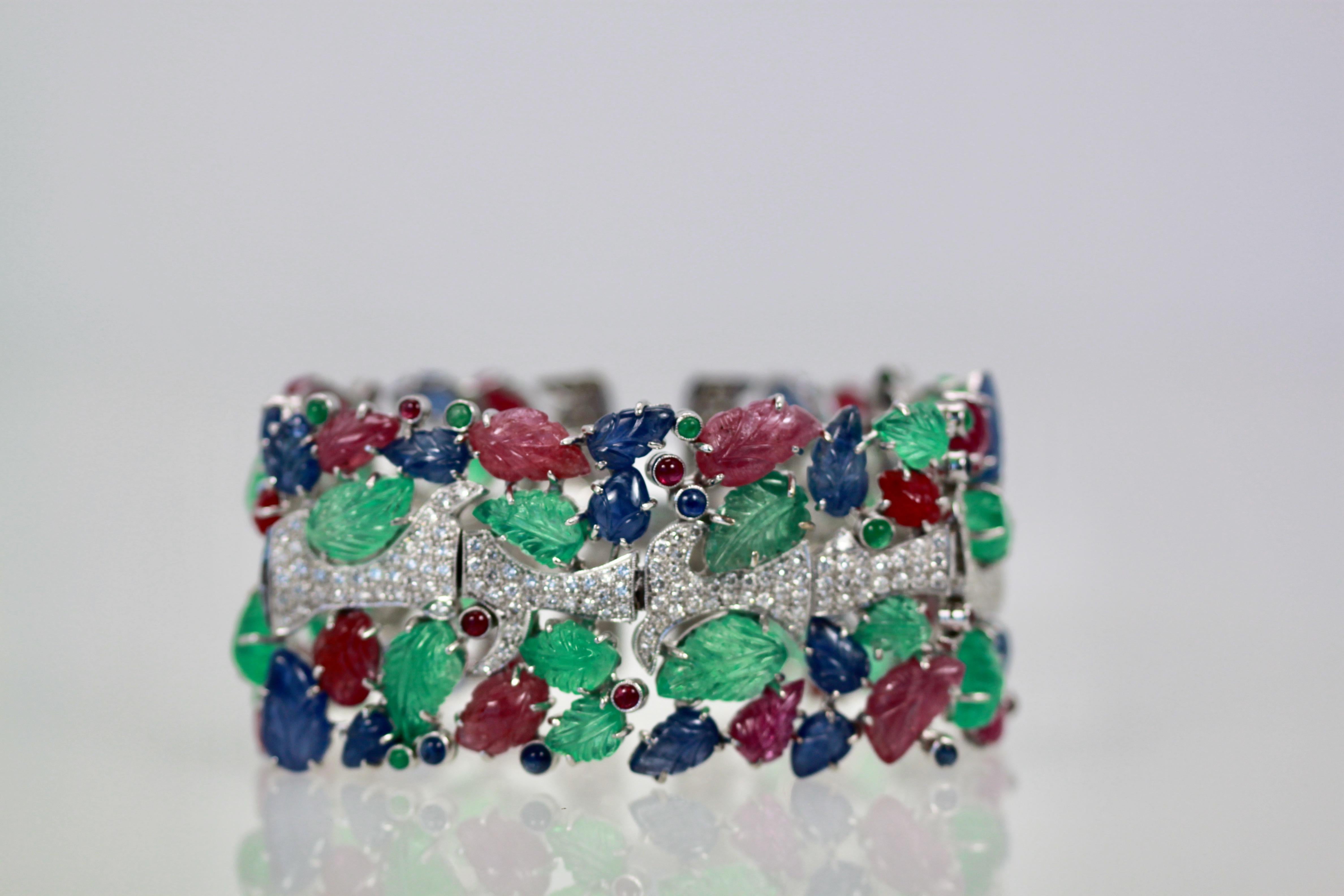 Art Deco Tutti Frutti Carved Stones Diamond Bracelet 18 Karat Wide For Sale