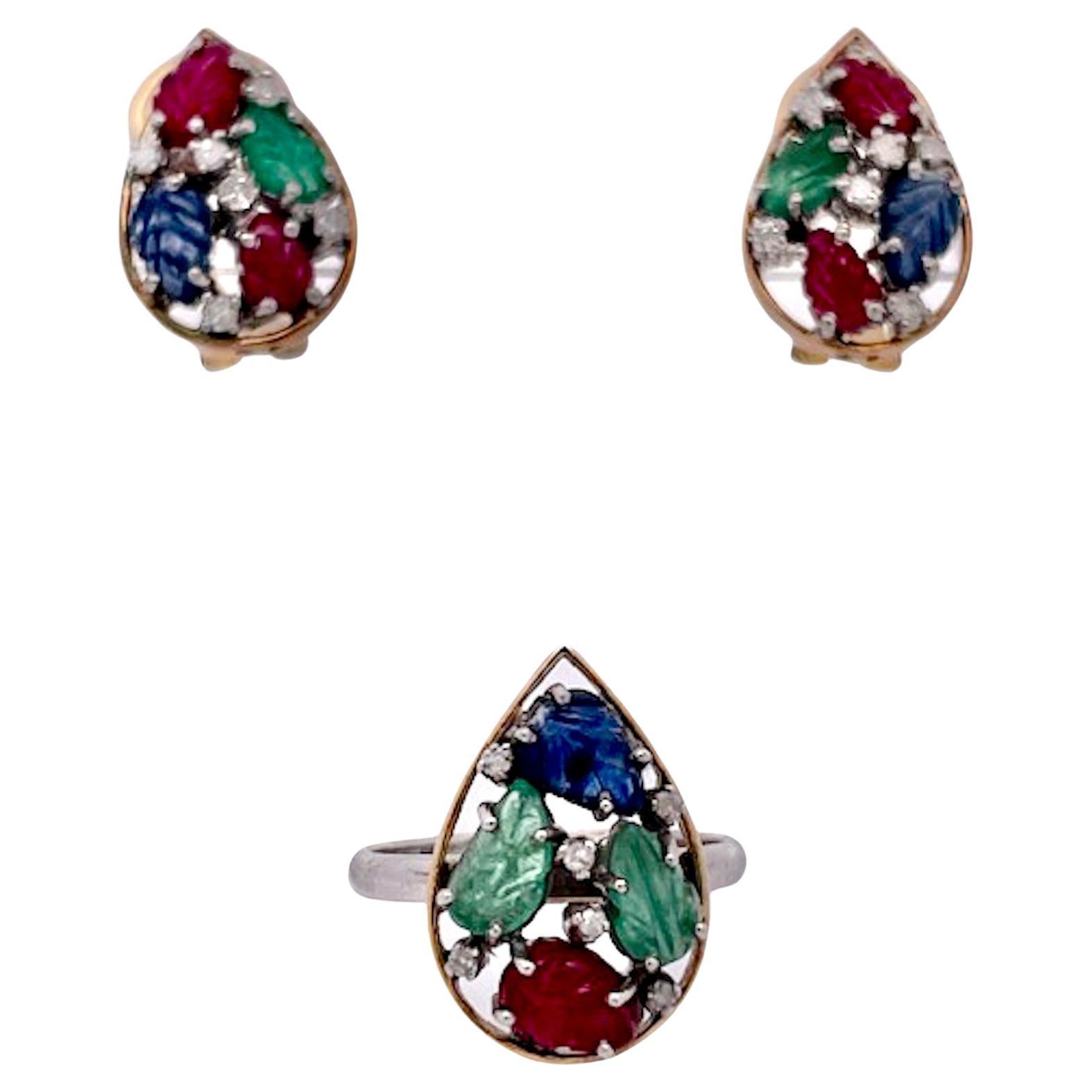 I purchased this set from an auction house in the Netherlands and was so happy to get them.  This Tutti Frutti set is highly unusual as it is a matched set in 14K Gold.  The earrings are set in a teardrop setting with two (2) rubies, one (1) Emerald
