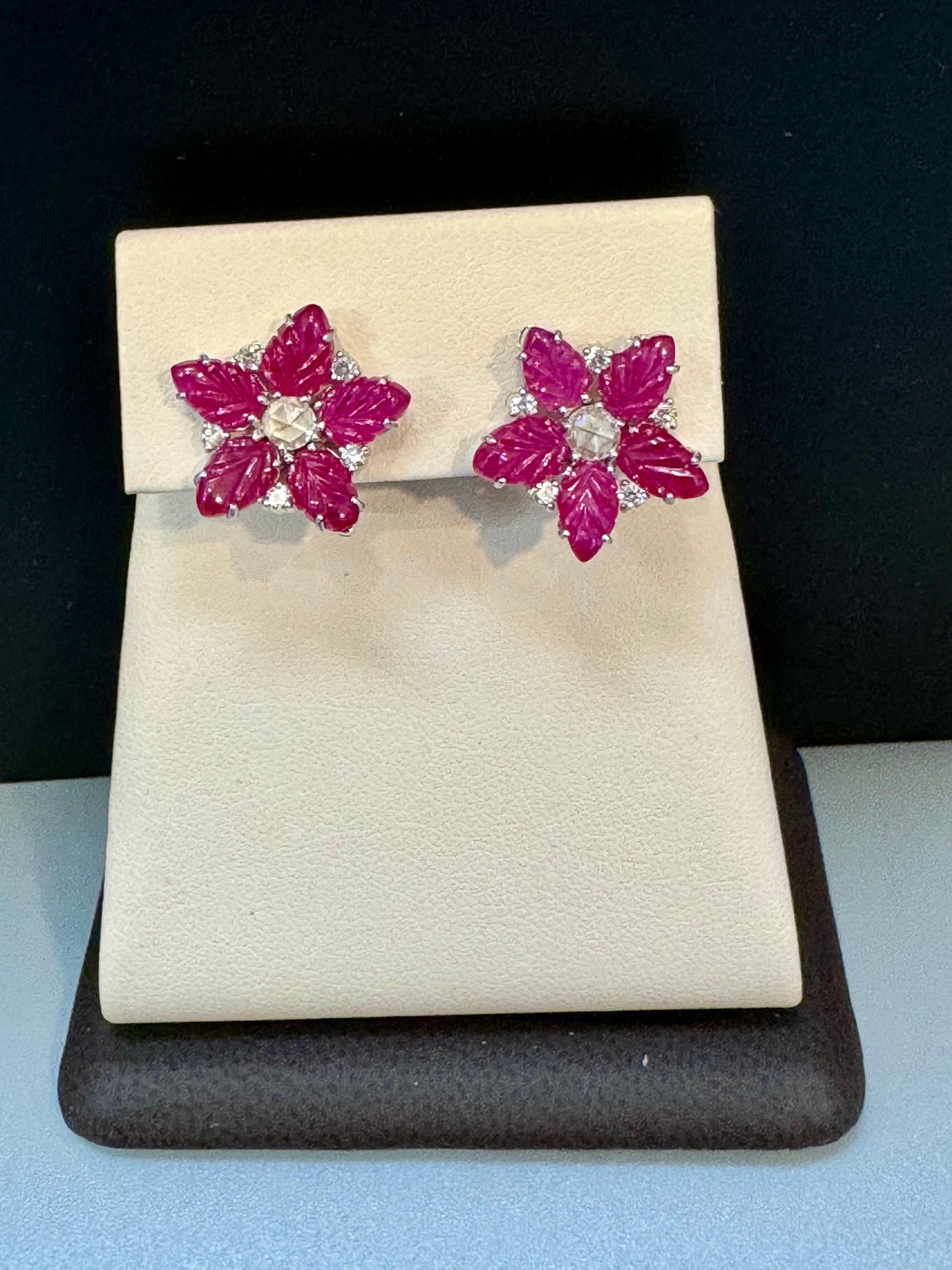 Tutti Frutti Earrings Natural  Ruby  Carved Leaves & Diamond Earrings in  18 KWG
Tutti Frutti Earrings/ Natural   Ruby  Earrings/ Carving Leaf 18 Karat white Gold.
Discover elegance in our carved Ruby Leaves with  Diamond Post Earrings crafted with
