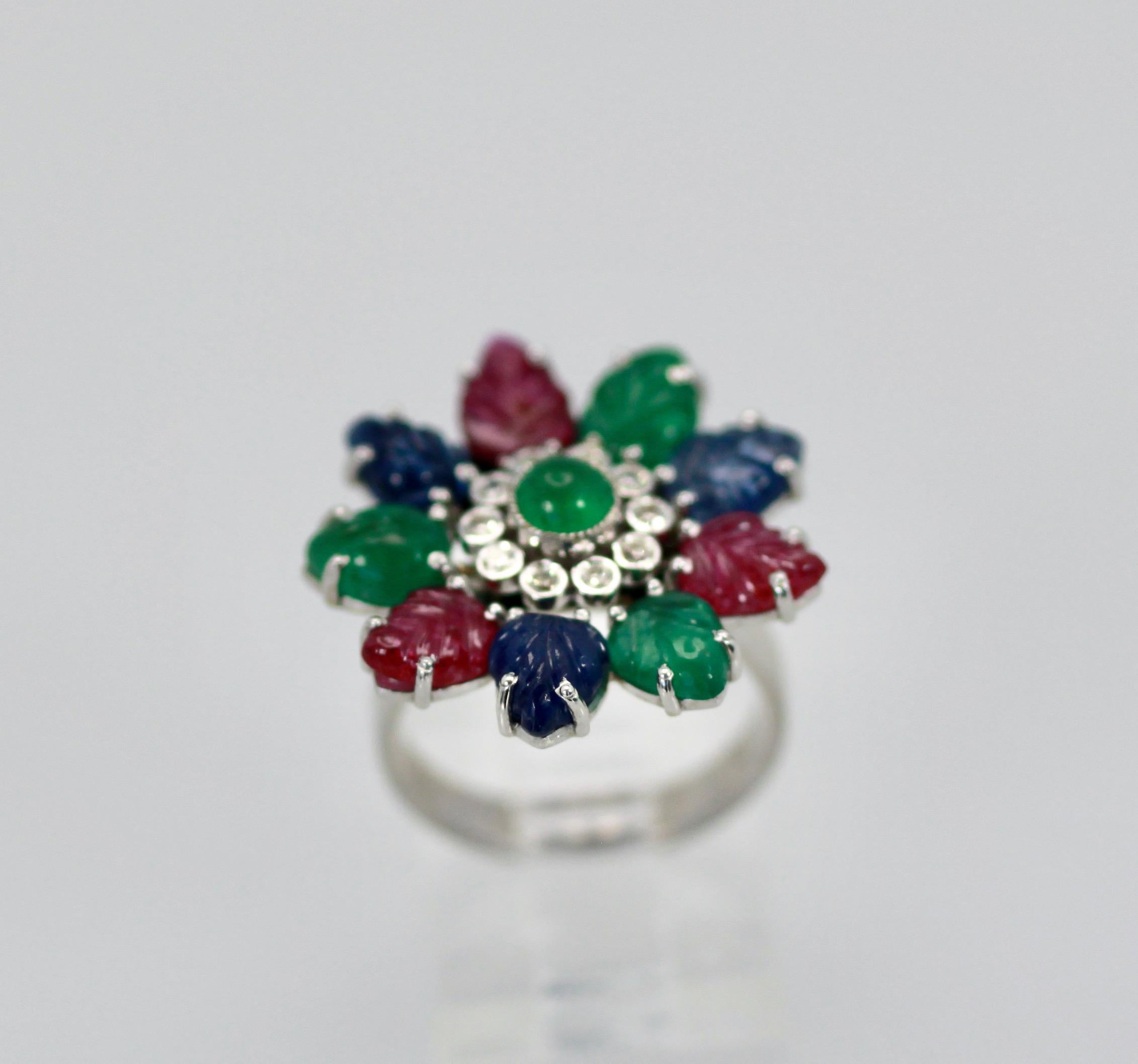 I just love this Tutti Frutti.  So you know, Tutti Frutti refers to any piece of jewelry that is three colored gemstones of carved leaf design in Ruby Emerald and Sapphire.  Most popular in the 1920's when Cartier found inspiration in Moghul