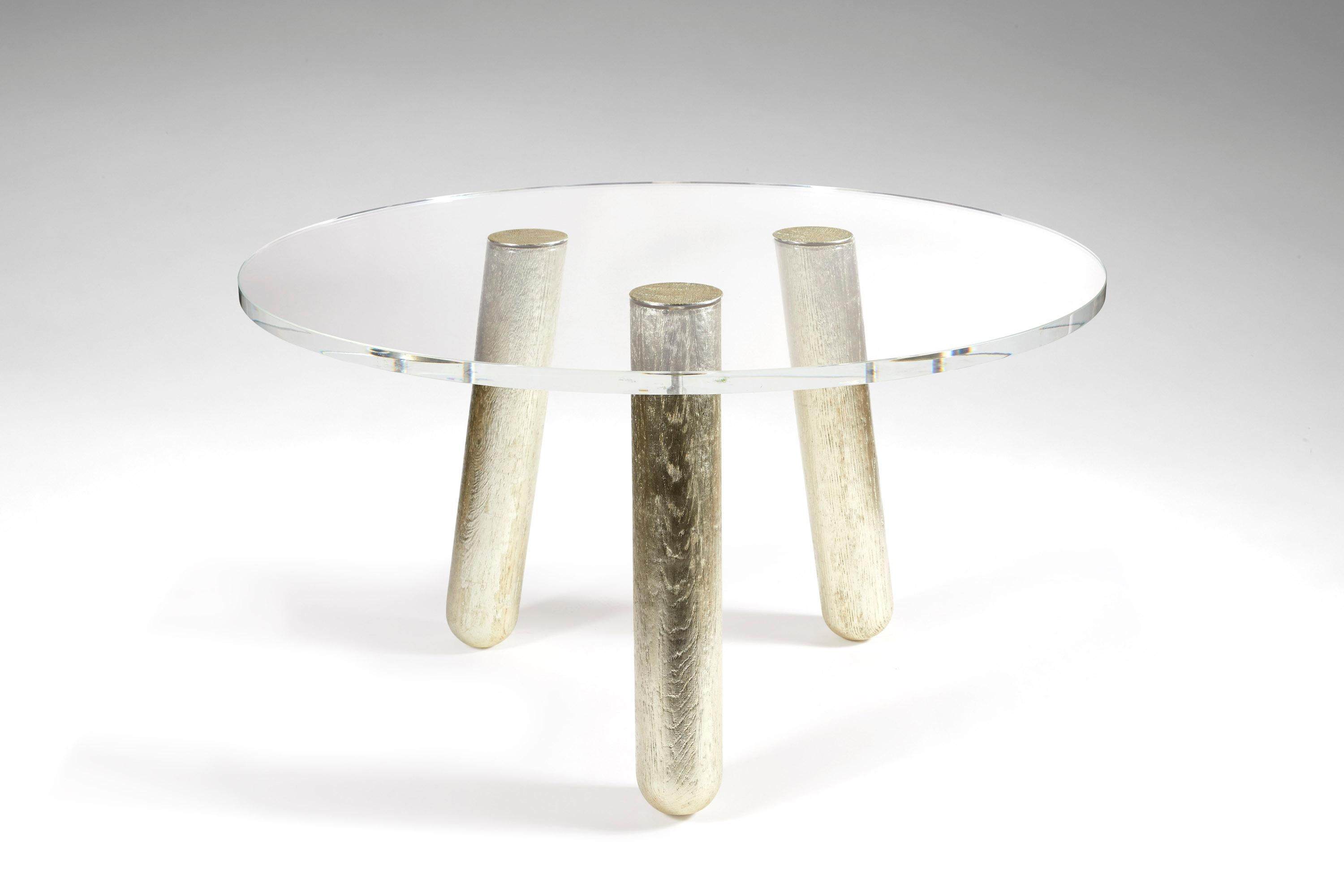 Tutti Frutti.
Round dining table. 
Cat-Berro edition 2008
Top in transparent acrylic. 
Legs in sanded oak covered with colored varnished aluminium leaves or golden leaves.
O 51’’. H 29 ½ ’’.
O 130cm. H 75cm.

Signed piece of a limited edition of 8 +