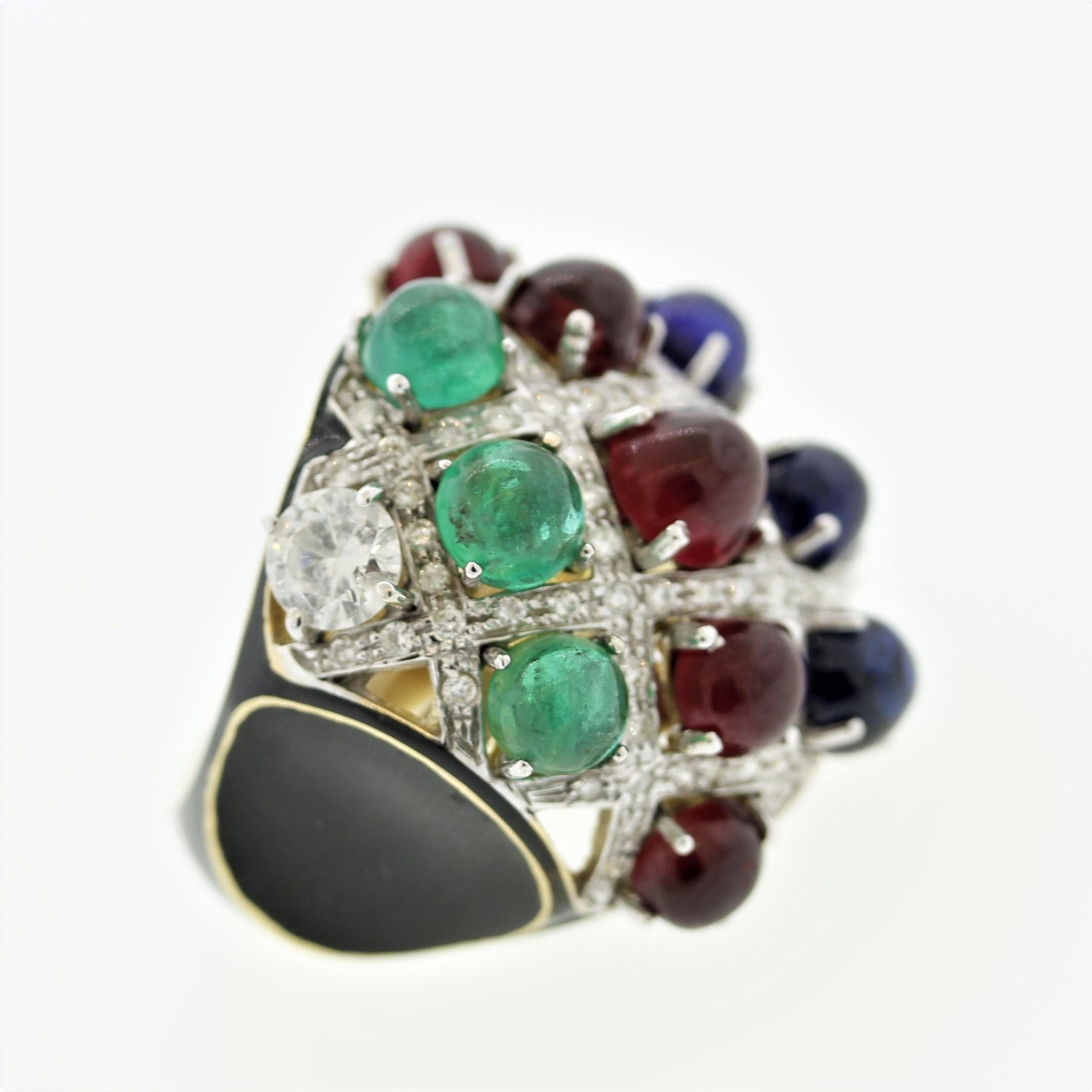 A bright colorful tutti frutti ring featuring 5 bright vivid red rubies, 3 royal blue sapphires, and 3 jelly green emeralds, all of which are fine gem quality. The ring is accented by round brilliant-cut diamonds which add sparkle and brilliance.