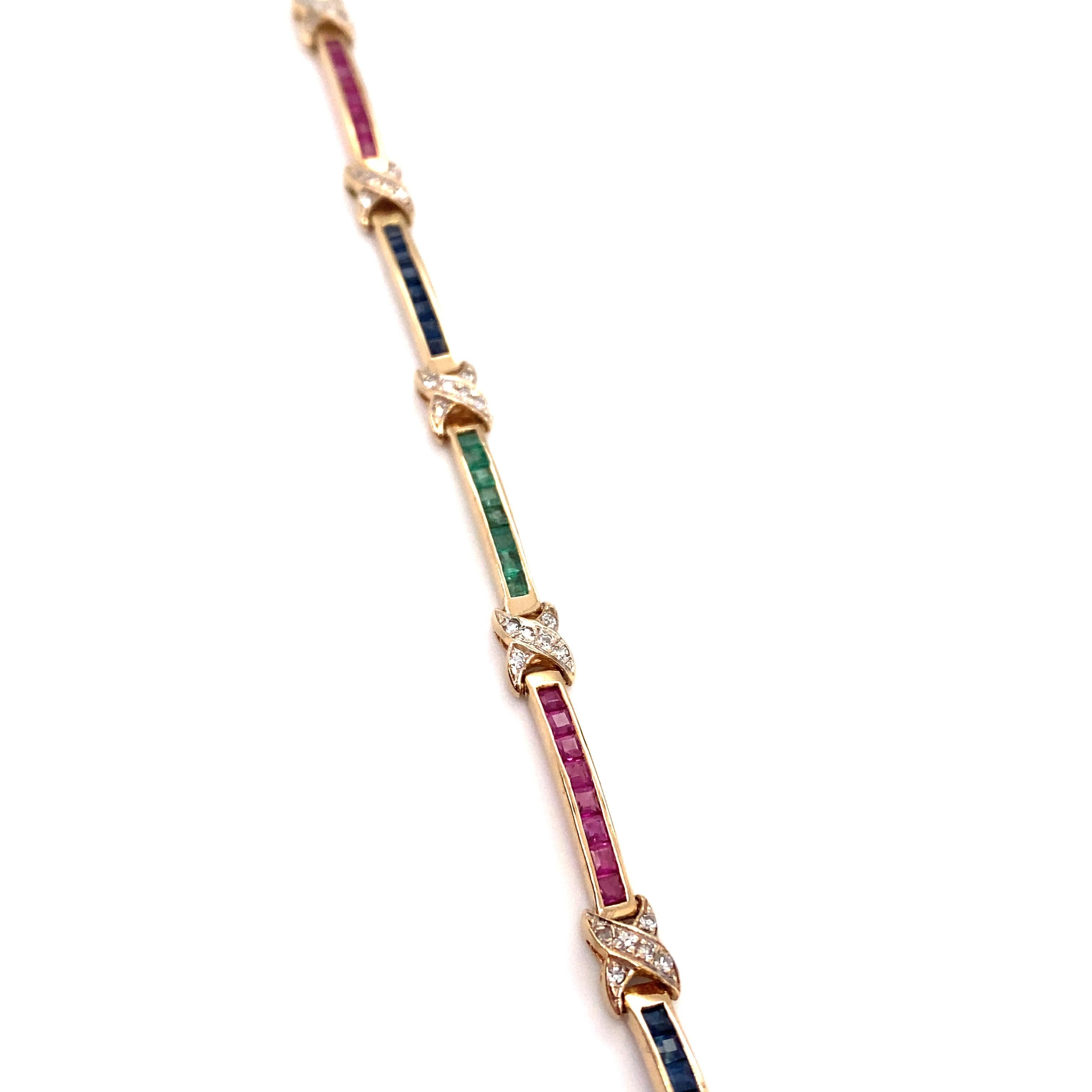 Item Details: This Tutti Frutti style bracelet features links with emeralds, sapphires, rubies and diamonds in a channel set design.

Circa: 1980s
Metal Type: 14k gold
Weight: 9.5 grams 
Dimensions: 7.75in length
