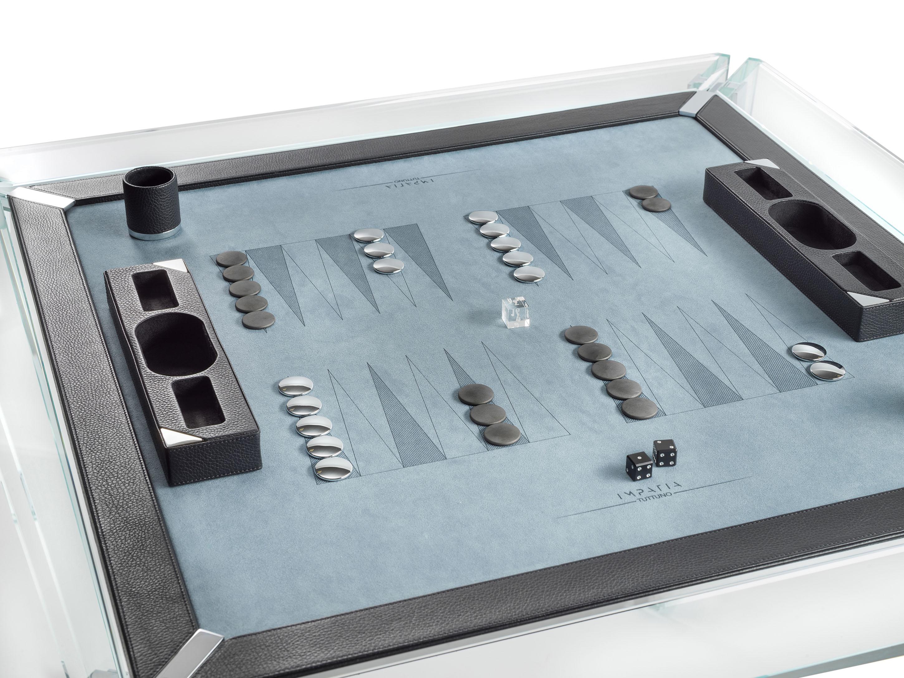 The Tuttuno leather edition backgammon game table is designed to accommodate two players with a built-in backgammon playing surface. The minimalistic design gives off the unique impression that the table is floating.

This Tuttuno table features a