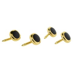 Tuxedo Shirt Studs, 4, in Yellow Gold centering Onyx, vintage, c. 1990.