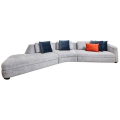 Tuya Angled Sofa, in off White Holly Hunt Fabrics, Dark Bronze Patina Feet