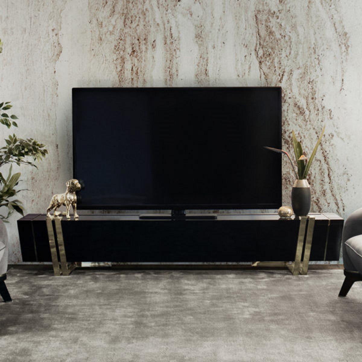 TV Cabinet is a defining presence and will change any room it is part of, creating a glorious atmosphere around it. A daring, yet elegant balance between the finest materials, Nero Marquina marble, gold plated brass, and black lacquered wood. An