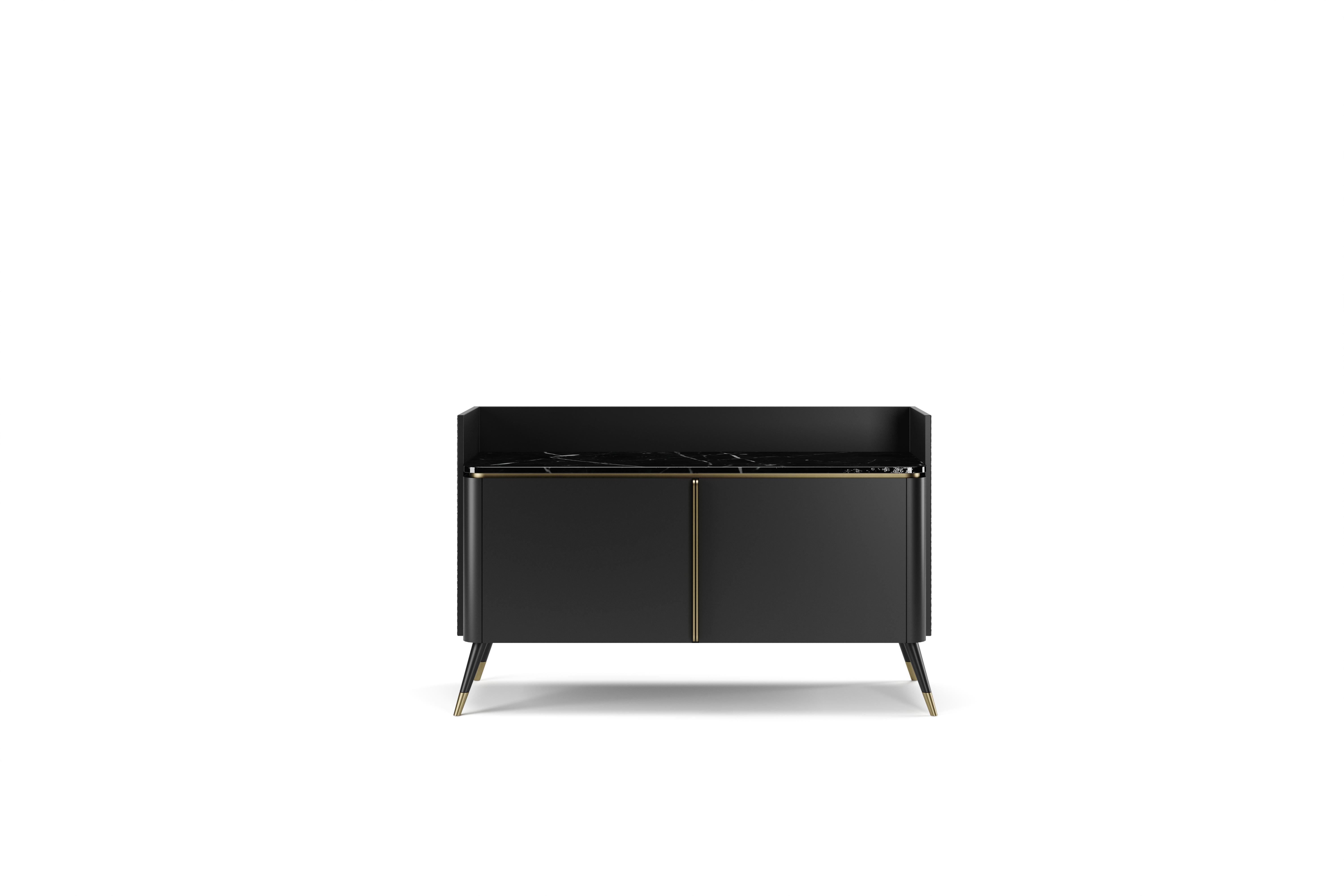 Fabrice is on feet tv sideboard with a veneered structure. It comes in a wooden lacquered box structure with crossed leather and lacquered doors. The top is in marbled stone and its legs have metal gold touches.

Fabrice is available in foreign