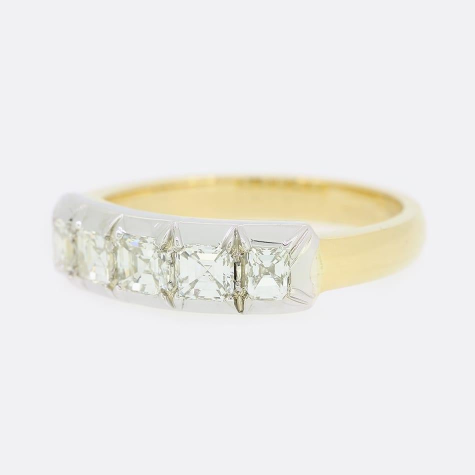 This is a beautiful diamond five stone ring. The ring features a Georgian style cut down setting with five asscher cut diamonds which has been crafted in silver with a yellow gold band. The diamonds have been excellently matched for colour and