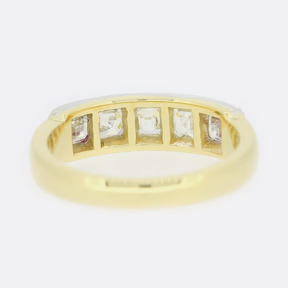 This is a beautiful diamond five stone ring. The ring features a Georgian style cut down setting with five asscher cut diamonds which has been crafted in silver with a yellow gold band. The diamonds have been excellently matched for colour and