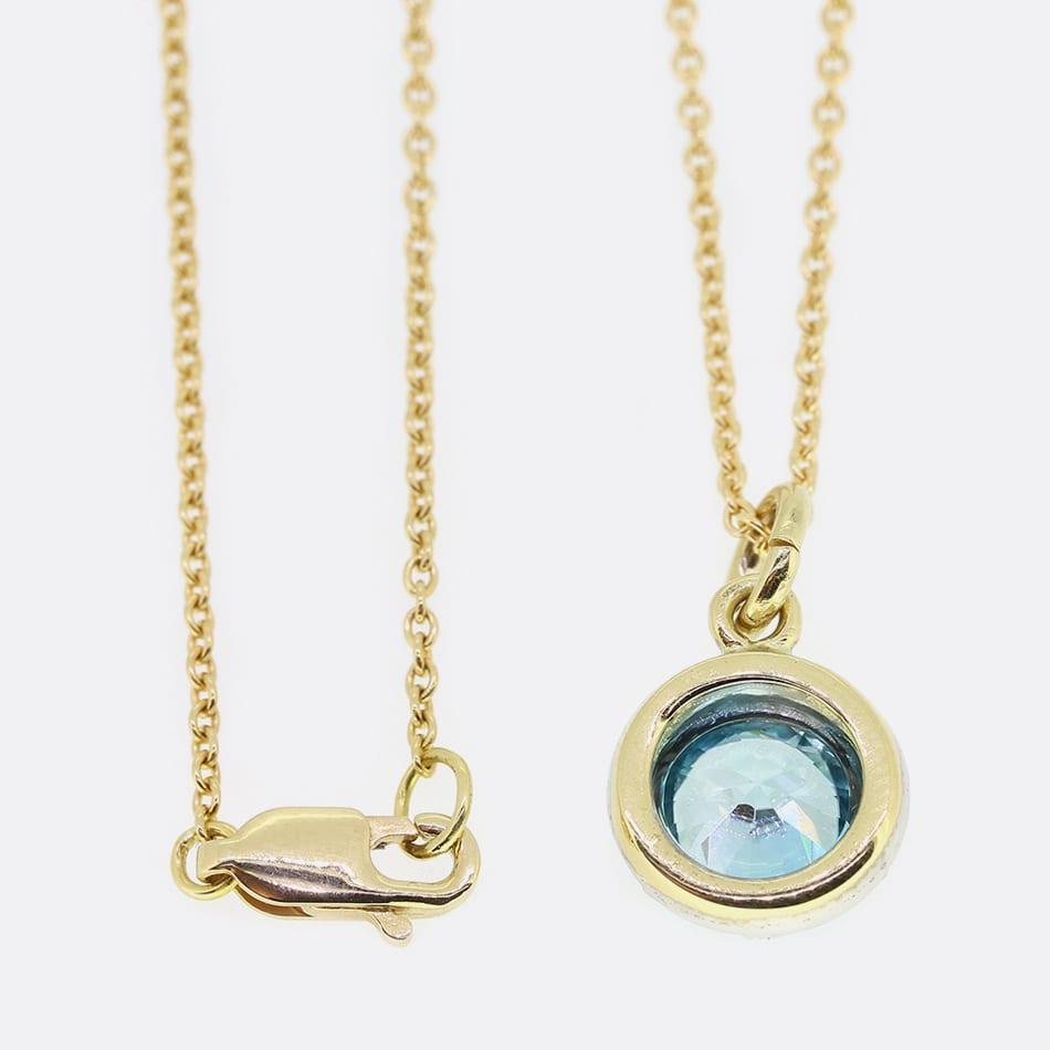 This is a beautiful pendant necklace. The pendant features a Georgian style cut down setting with a round blue zircon which has been crafted in 18ct yellow gold and silver, suspended on a 16 inch chain.
This collection is inspired by Victorian and