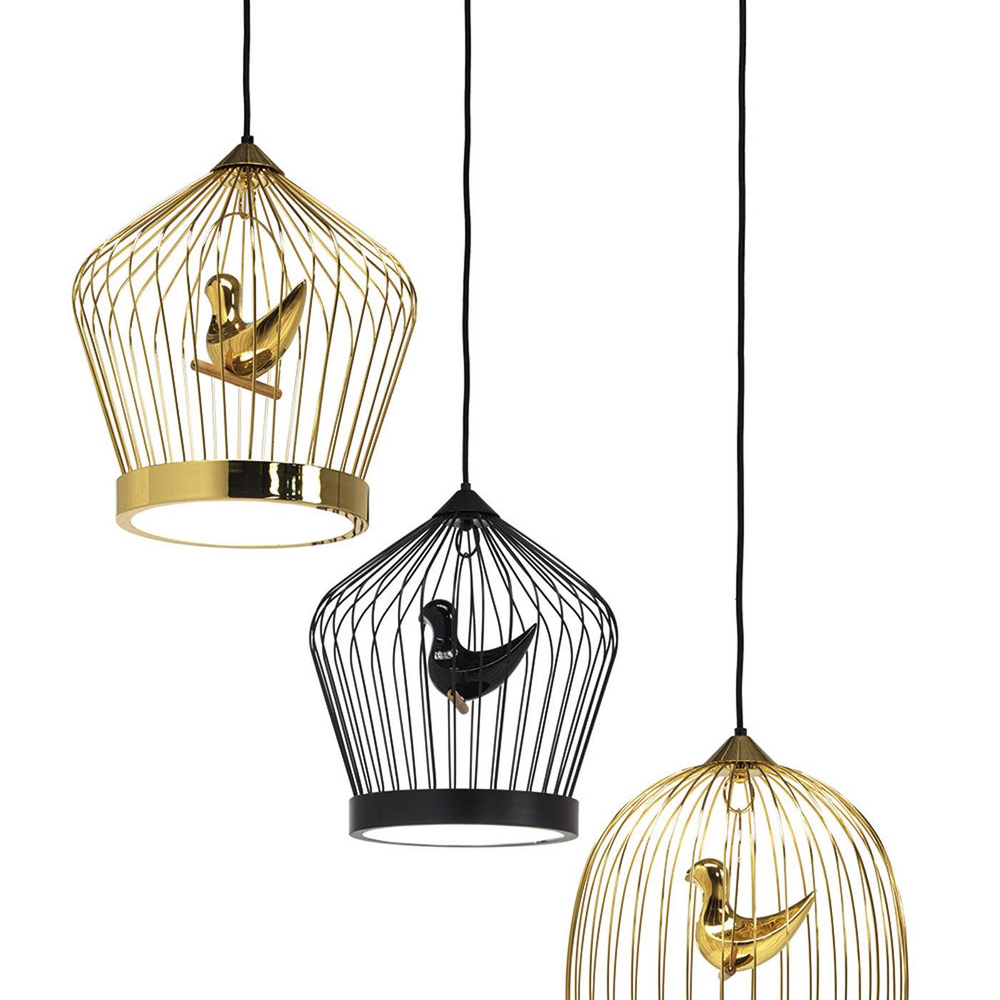 This refined and charming suspension lamp designed by Jake Phipps is inspired by the ancient tradition, popular from the Romans to the Middle Ages, of holding canary and songbirds at home in ornate cages. The double polycarbonate diffuser with LED