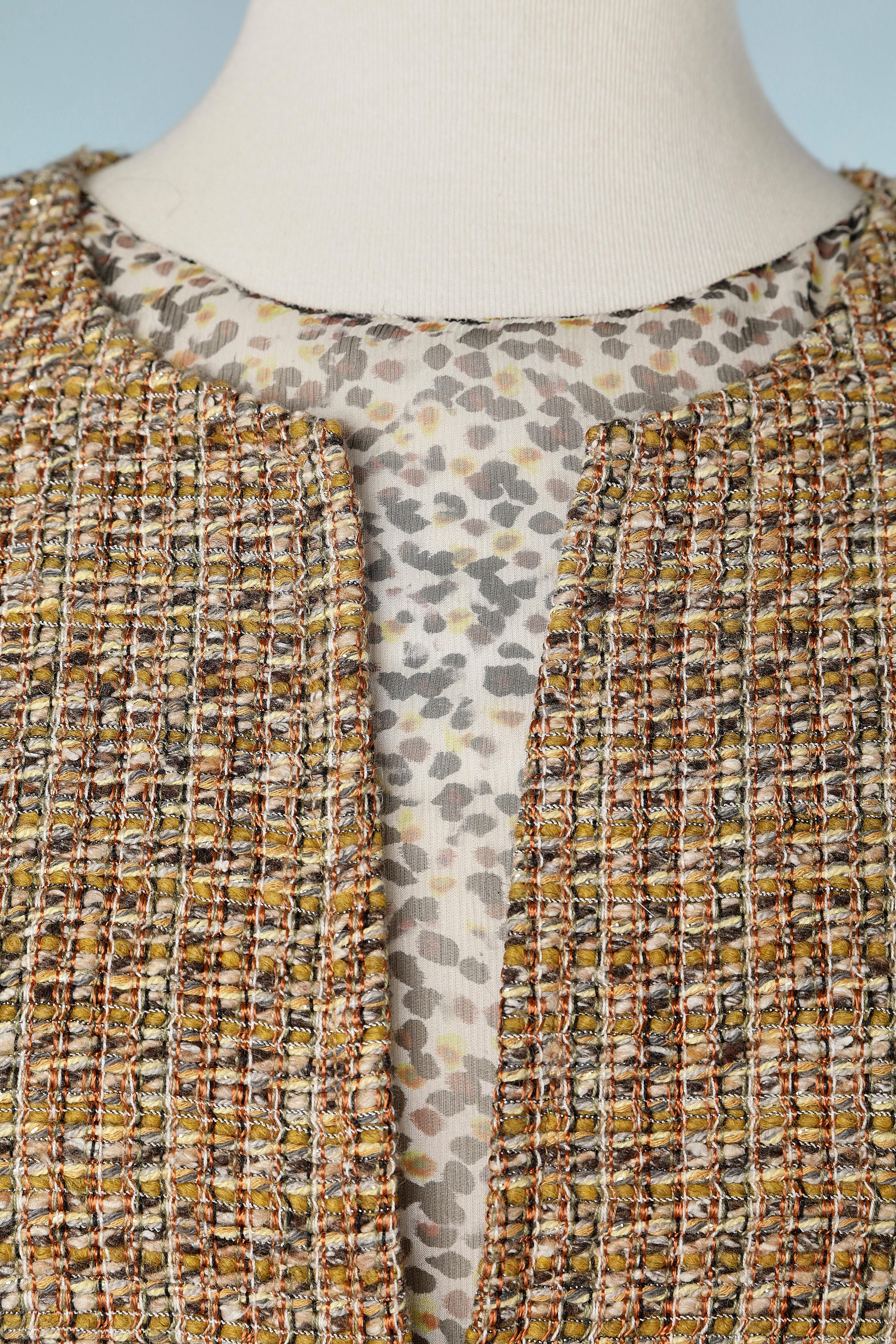 Tweed and printed chiffon cocktail dress. Zip in the bottom middle front. 
Silk lining. 
SIZE 36