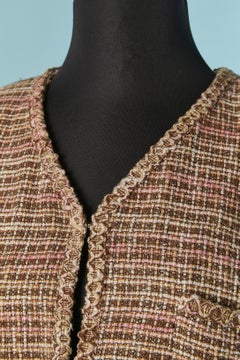 Tweed edge to edge jacket with fabric Camelia brooch CHANEL