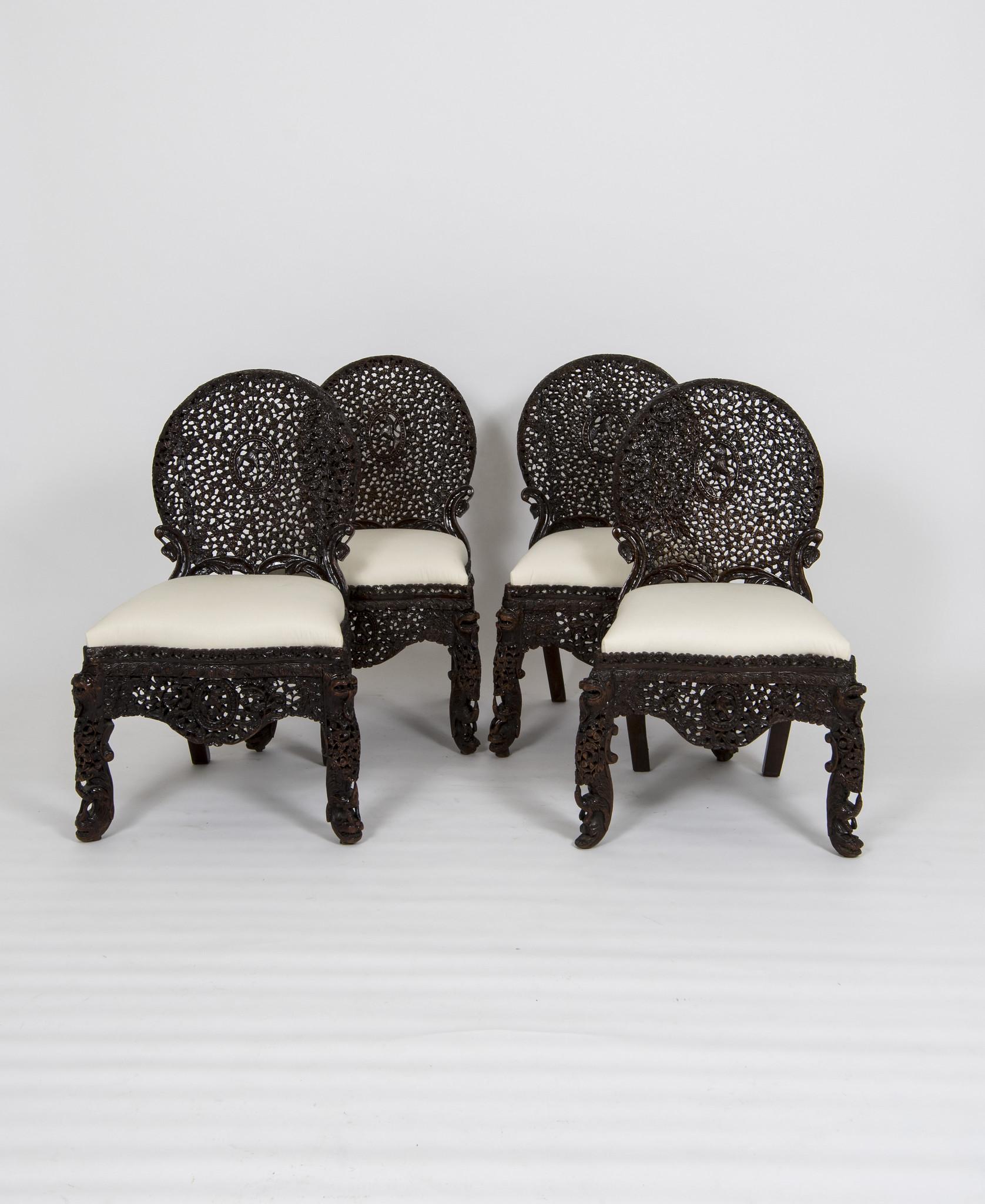 Hand-Carved Twelve 19th Century Anglo-Indian Carved Dining Chairs