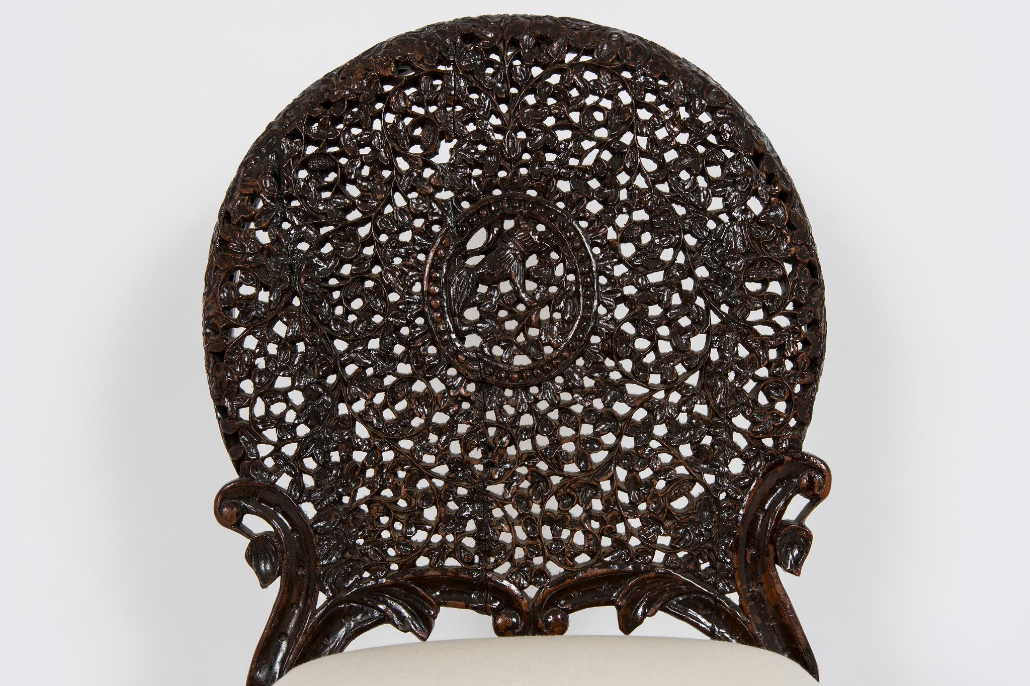Twelve 19th Century Anglo-Indian Carved Dining Chairs In Good Condition In Houston, TX