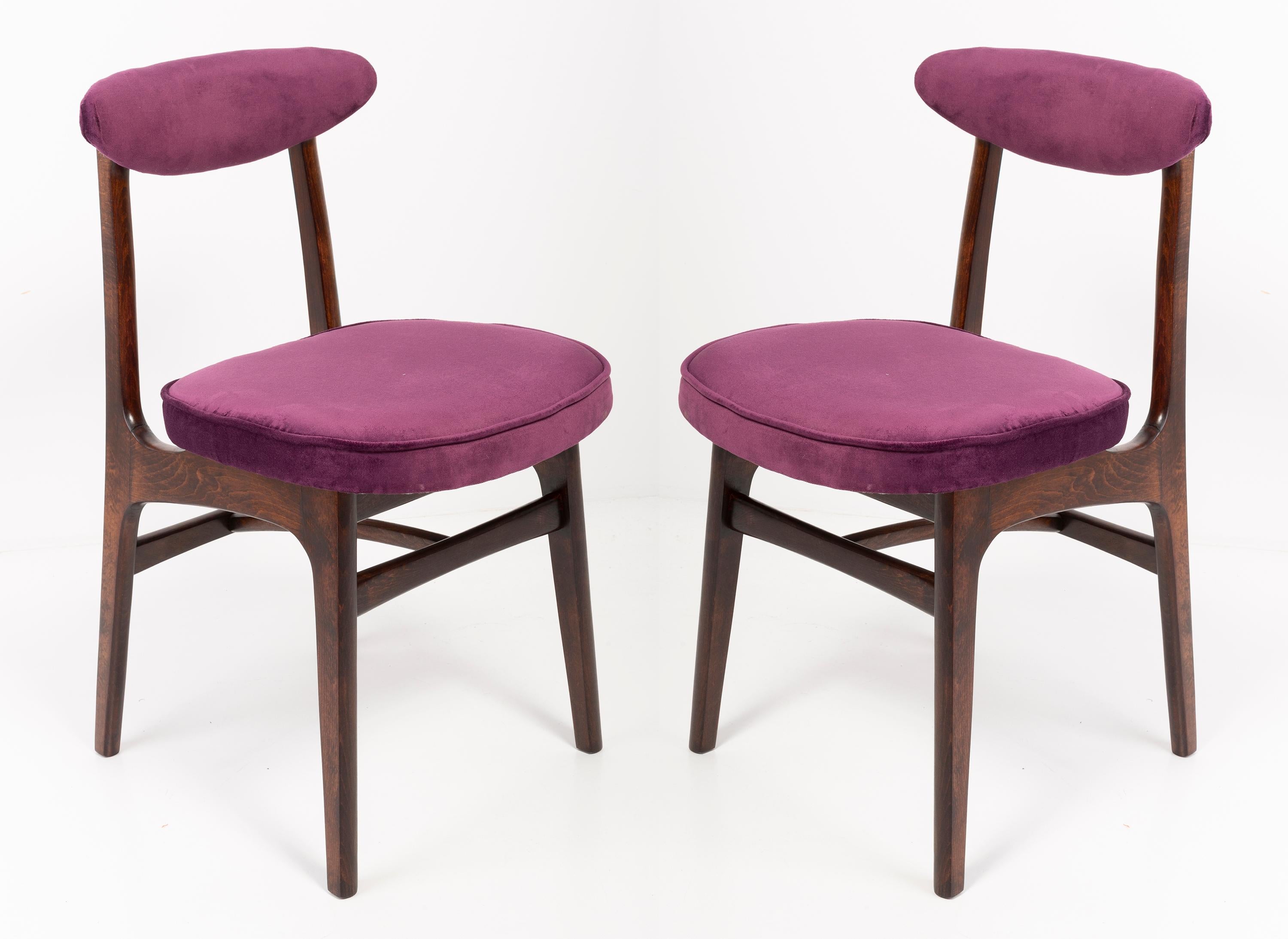 Twelve chairs designed by Prof. Rajmund Halas. It has been made of beechwood. Chairs are after undergone a complete upholstery renovation, the woodwork has been refreshed. Seats and backs were dressed in a plum (color 969), durable and pleasant to