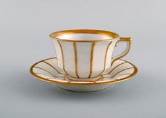 Twelve Antique Royal Copenhagen Angular 447 Coffee Cups with Saucers