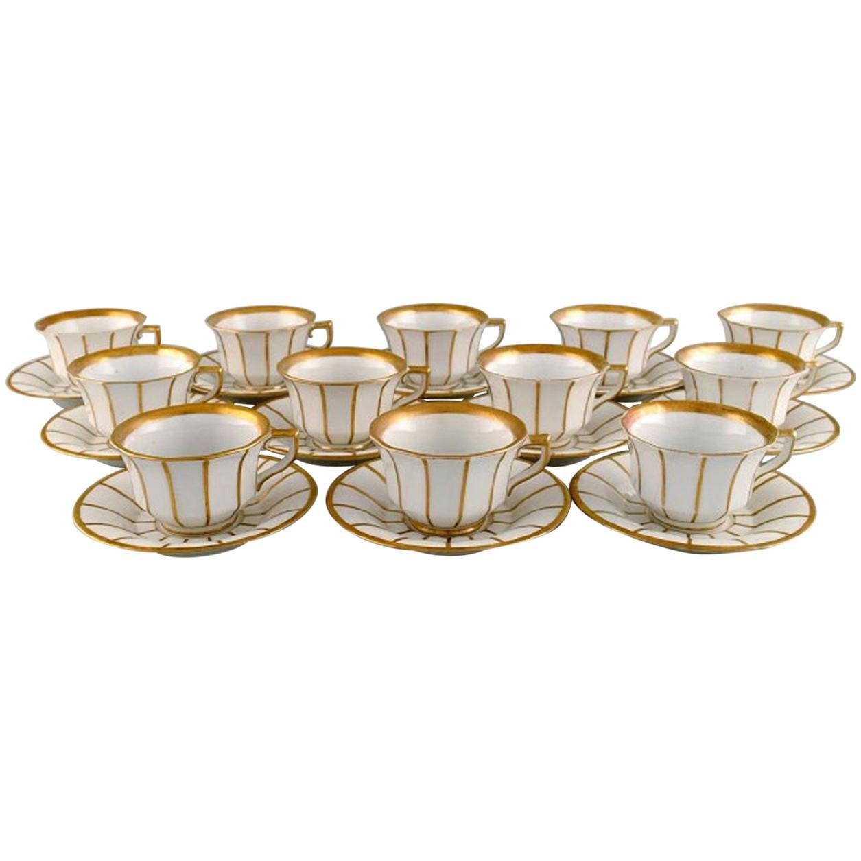 Twelve Antique Royal Copenhagen Angular 447 Coffee Cups with Saucers at