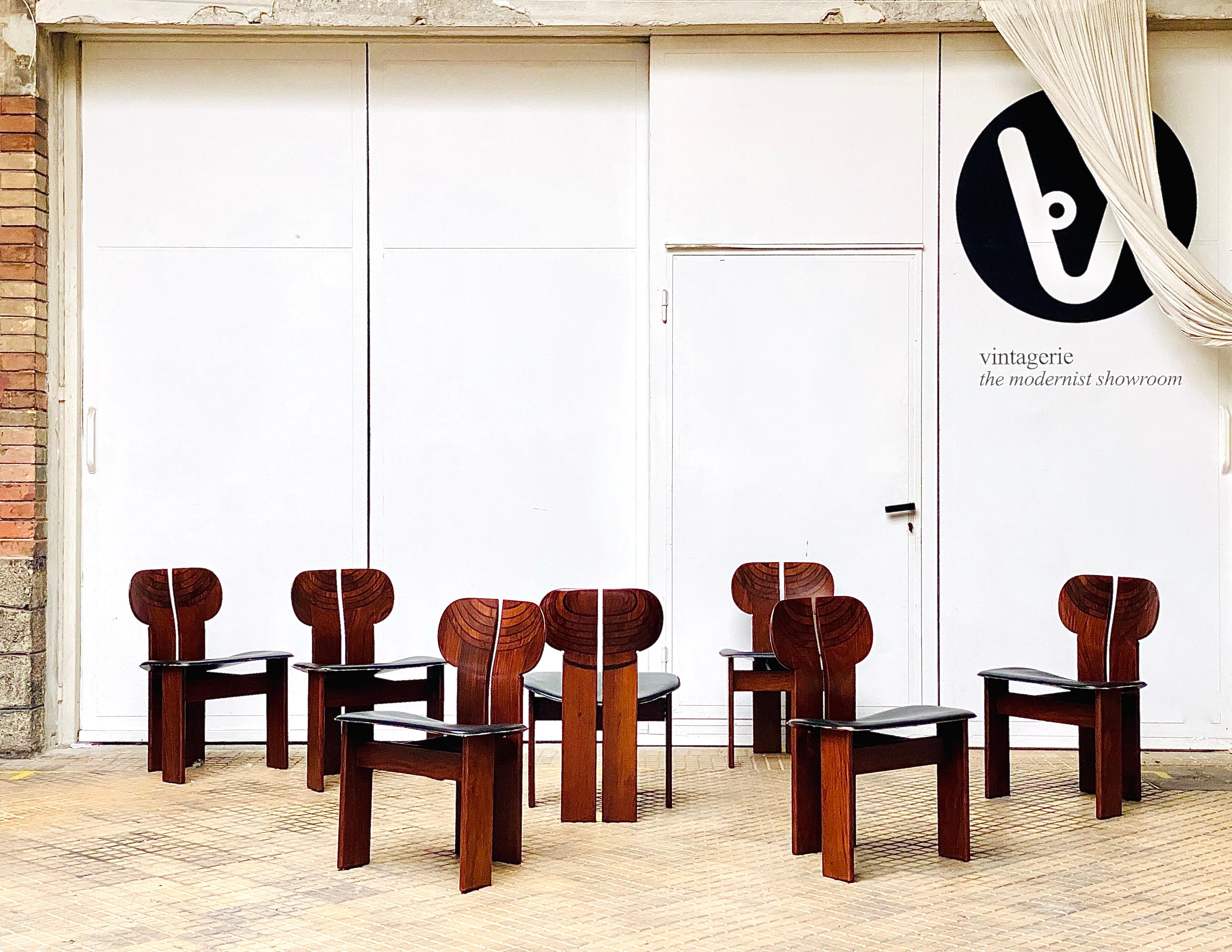 A set of up to 12 superb, Africa“ dining chairs from the 1970s. Designed in 1975 by Aura & Tobia Scarpa as a part of the 