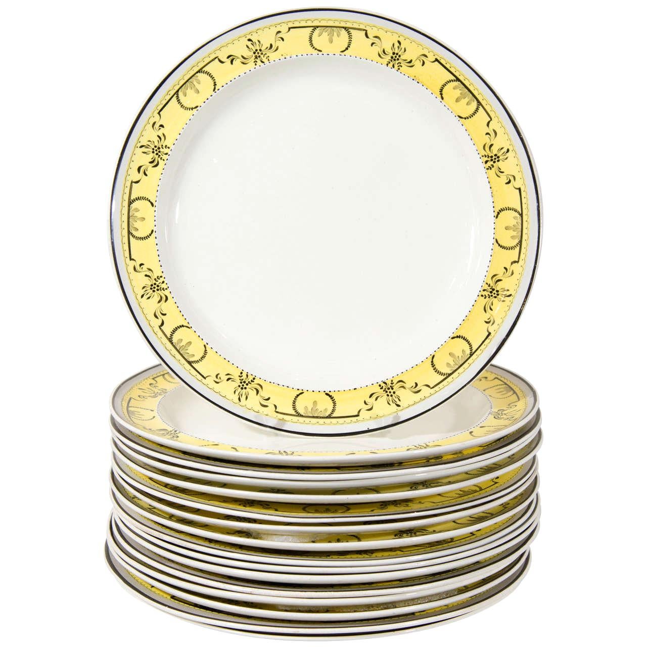 Twelve Creamware Dinner Plates with Yellow Neoclassical Borders Made circa 1800