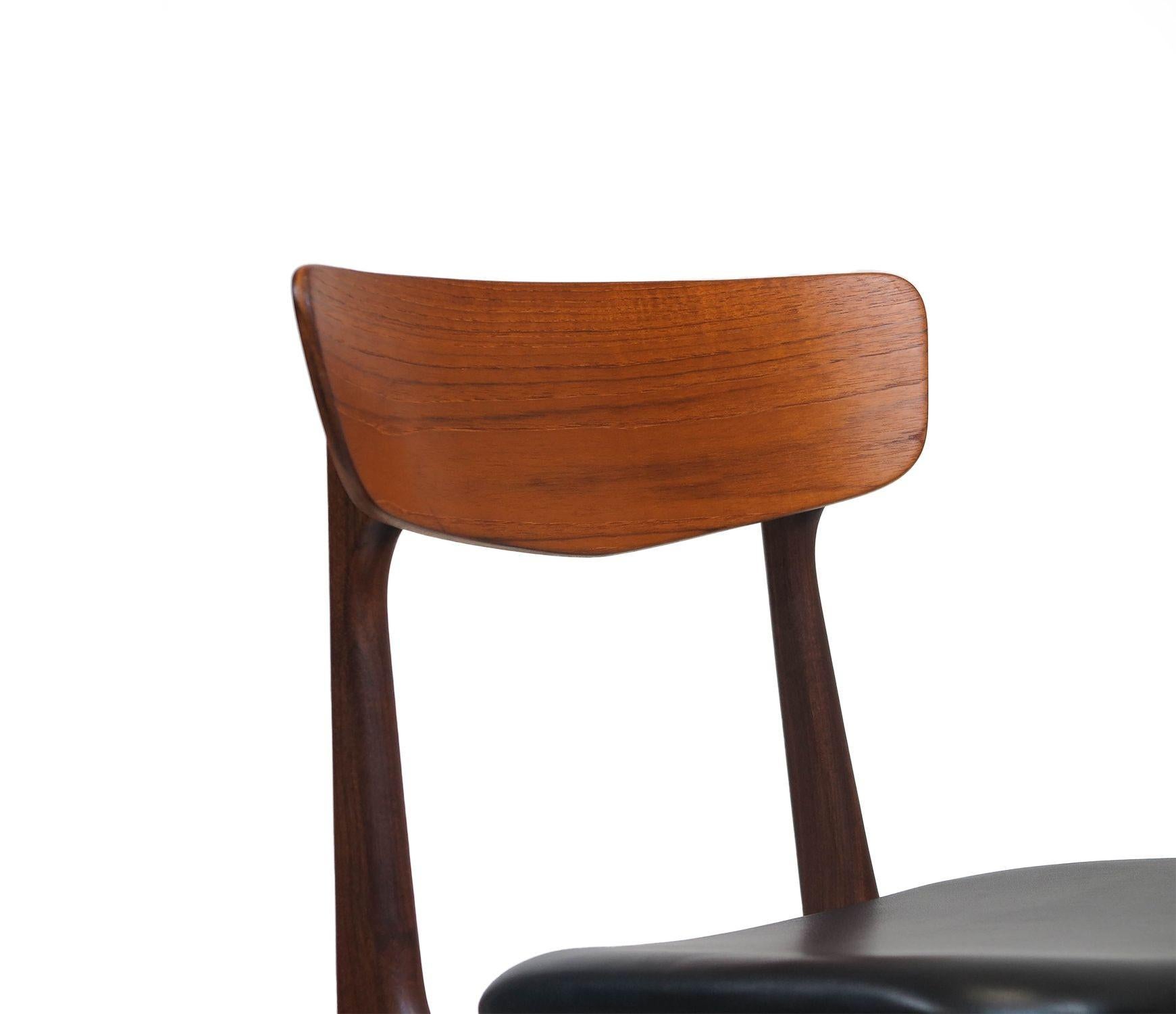 Oiled Twelve Danish Teak Dining Chairs in Black Leather For Sale