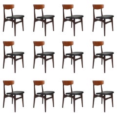 Twelve Danish Teak Dining Chairs in Black Leather