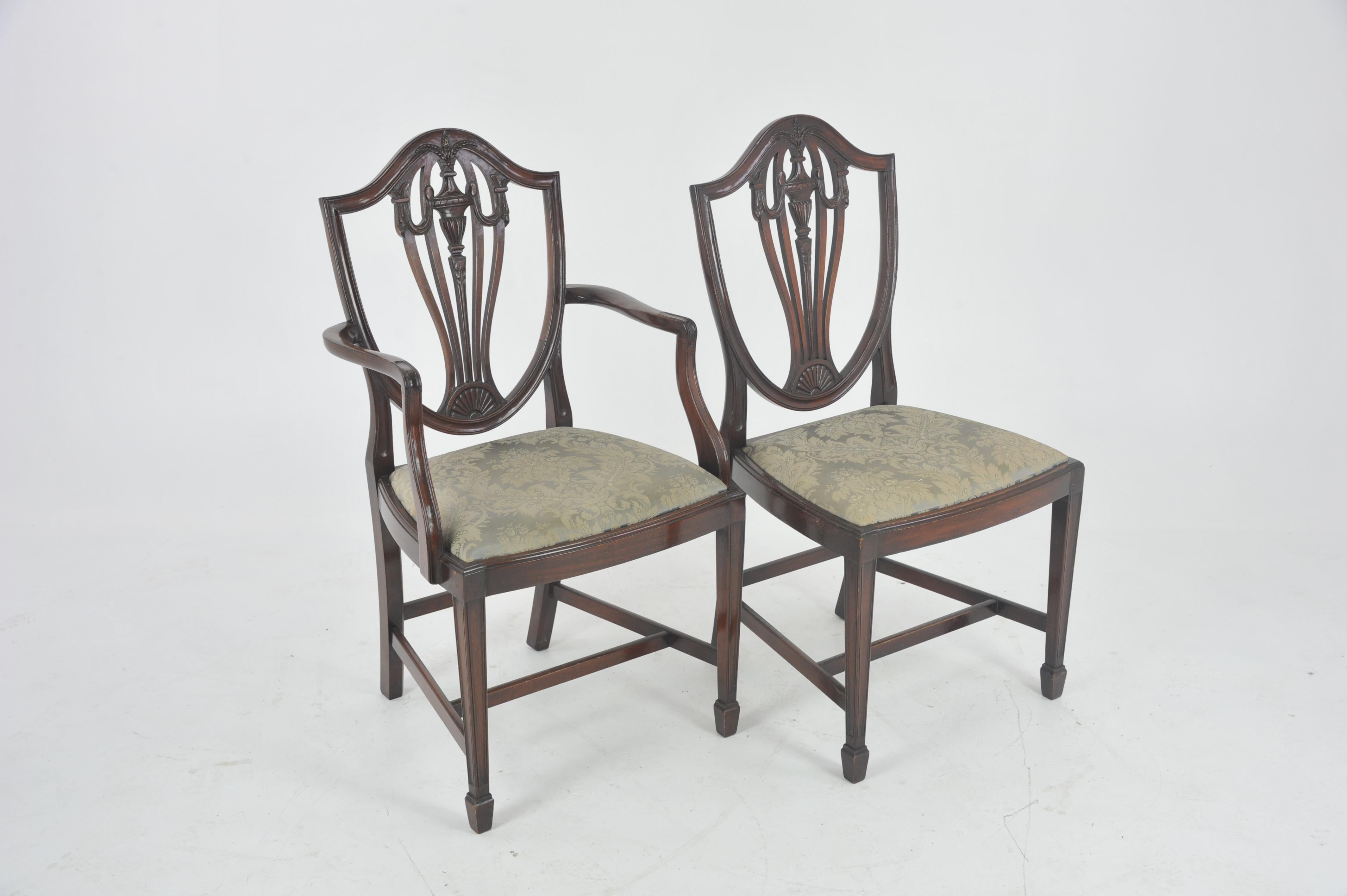 Twelve dining chairs, antique dining chairs, Hepplewhite chairs, walnut, Scotland 1930, Antique Furniture, B1071

Scotland, 1930
Solid walnut with original finish
Ten single and two armchairs
The backs are well carved with wheat sheaf