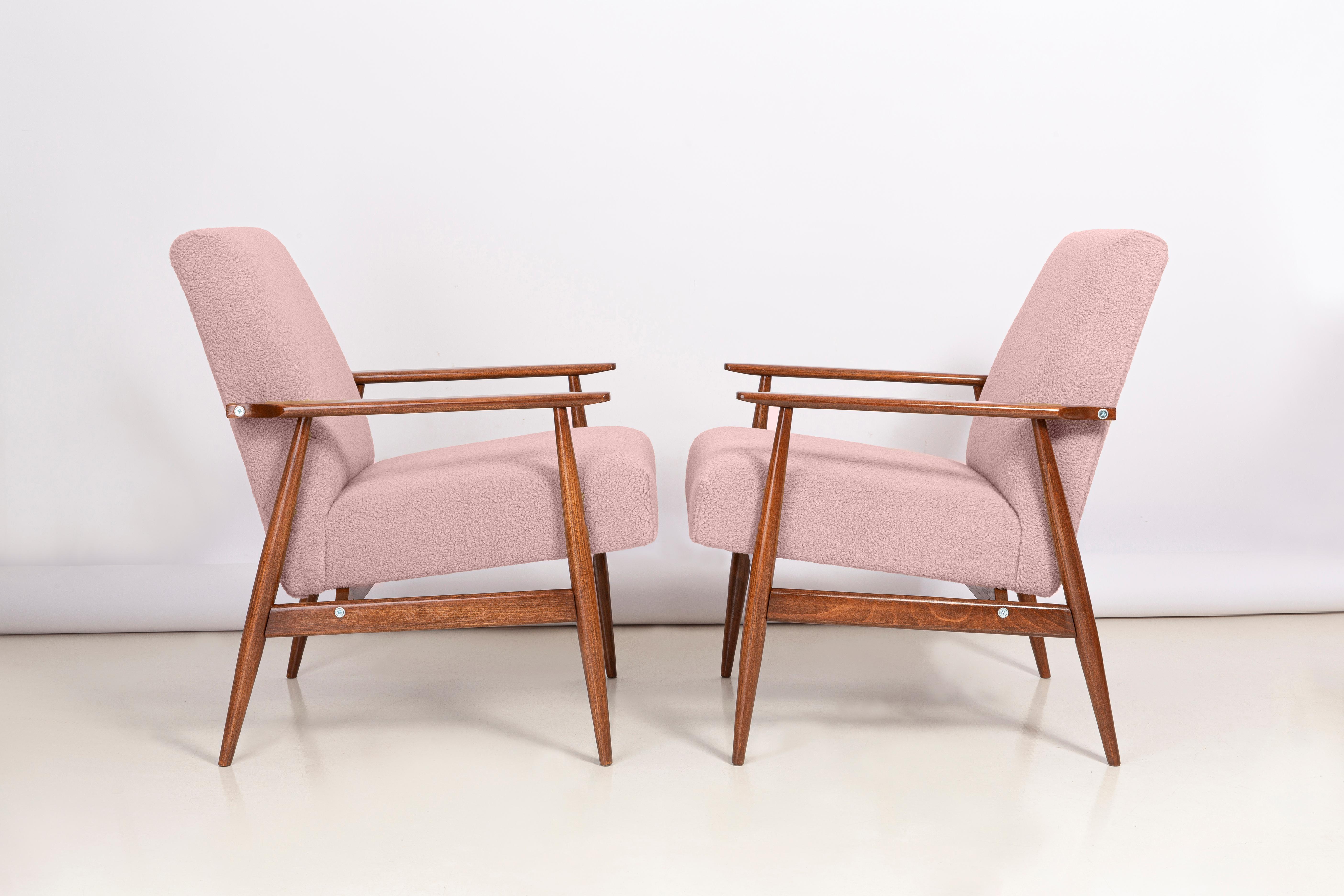 Pink bouclé armchairs, designed by Henryk Lis. Furniture after full carpentry and upholstery renovation. The armchair will be perfect in Minimalist spaces, both private and public. 

Upholstery in faux fur has a structure reminiscent of a dense,