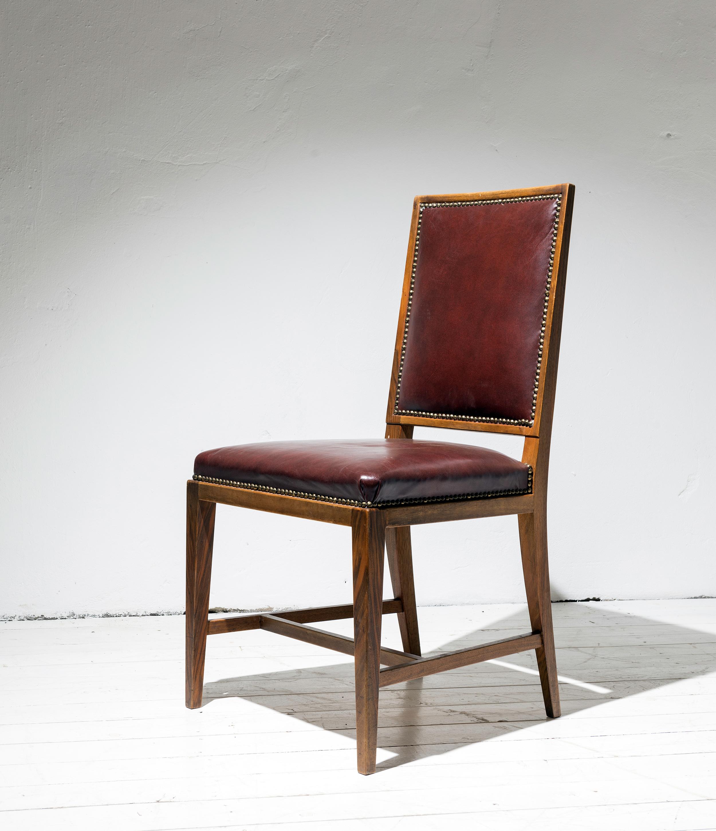 A suite of twelve or fourteen late 1940ies dining chairs inspired by
Jean-Michel Frank (1895-1941).
This model in mahogany, softwood veneered in mahogany, and old, possibly original leather upholstery.
Sweden or France