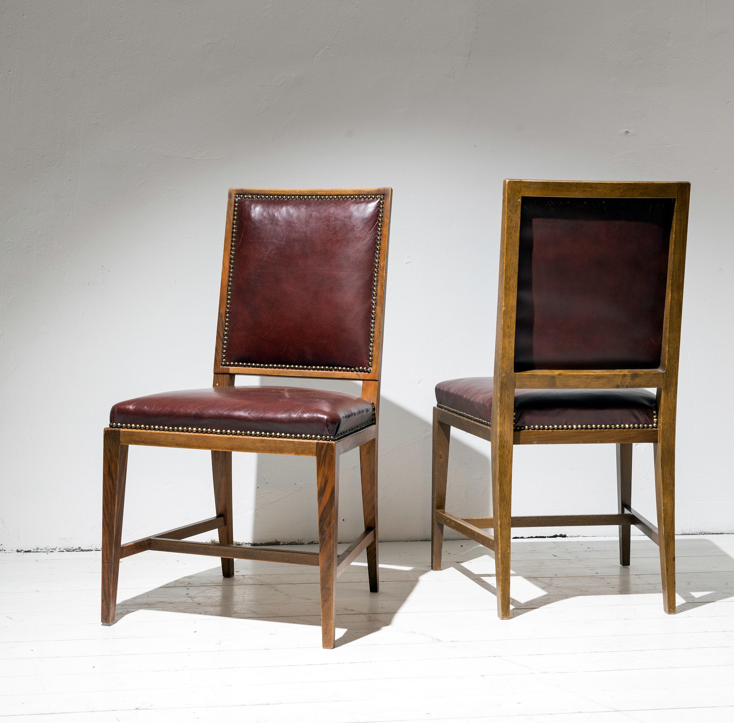 Veneer Twelve Elegant Mahogany and Leather Dining Chairs Inspired by Jean-Michel Frank