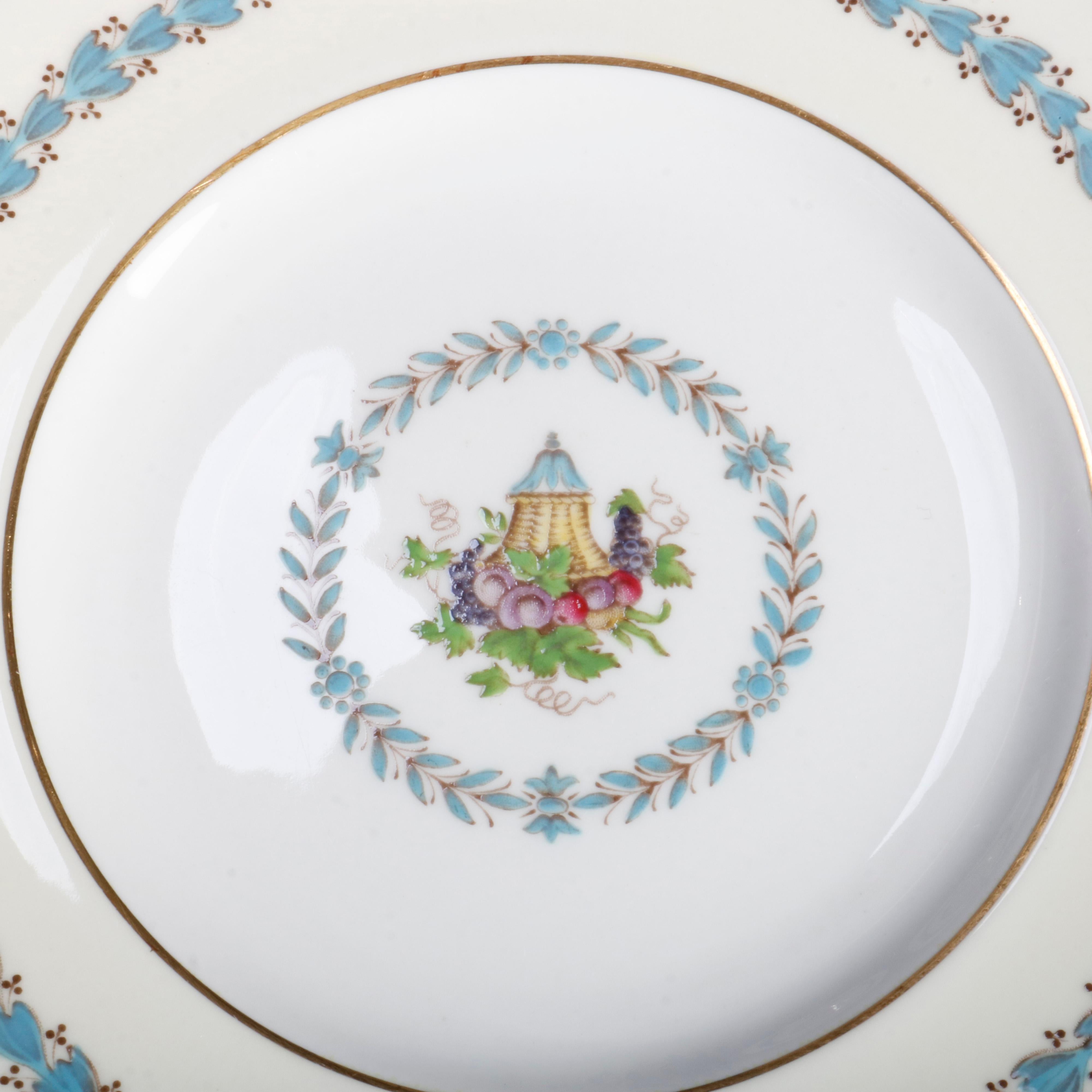 A set of 12 Wedgwood Appledore fine bone China salad plates offer central fruit basket with laurel wreath border, rim with inverted bellflowers, gilt highlights throughout, en verso maker mark as photographed, pattern W3257, 20th century.
Full set