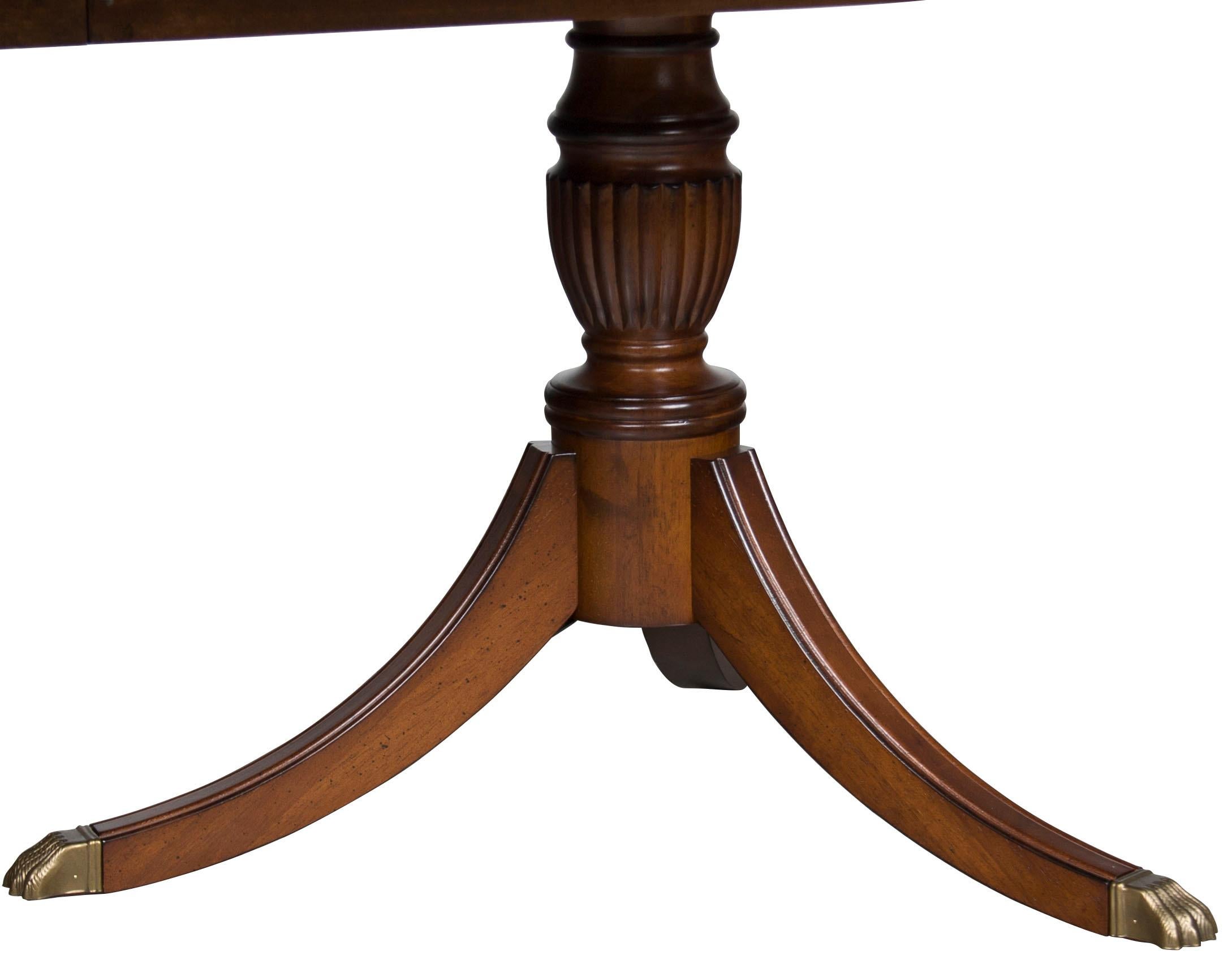 Here we have a stunningly crafted and beautiful double pedestal dining room table. Lovingly made with the finest woods chosen for their distinctive grain patterns, this piece will center any dining room in elegant style. Also, conveniently designed